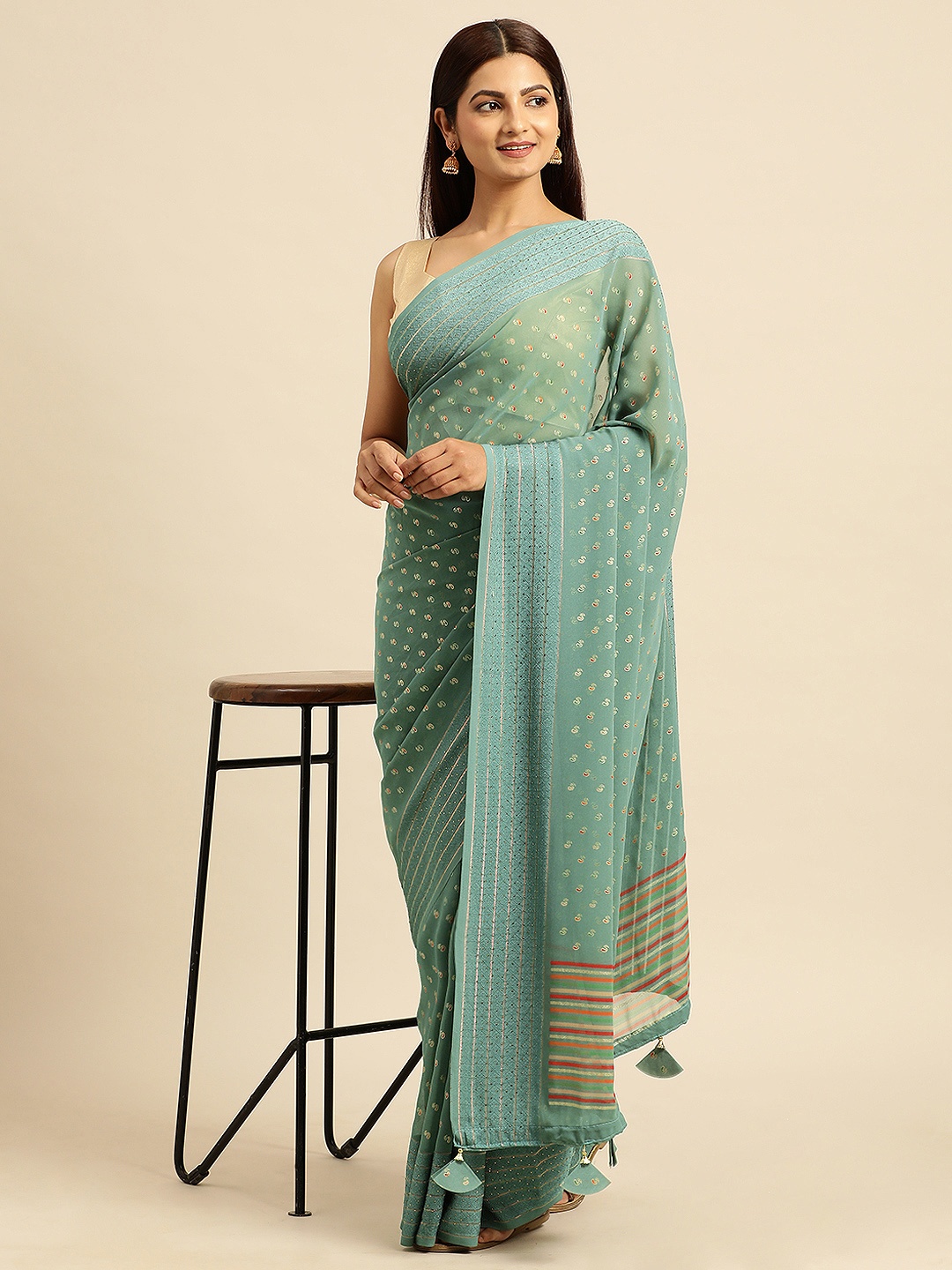 

Triveni Ethnic Motifs Printed Stones-Studded Pure Georgette Saree, Blue