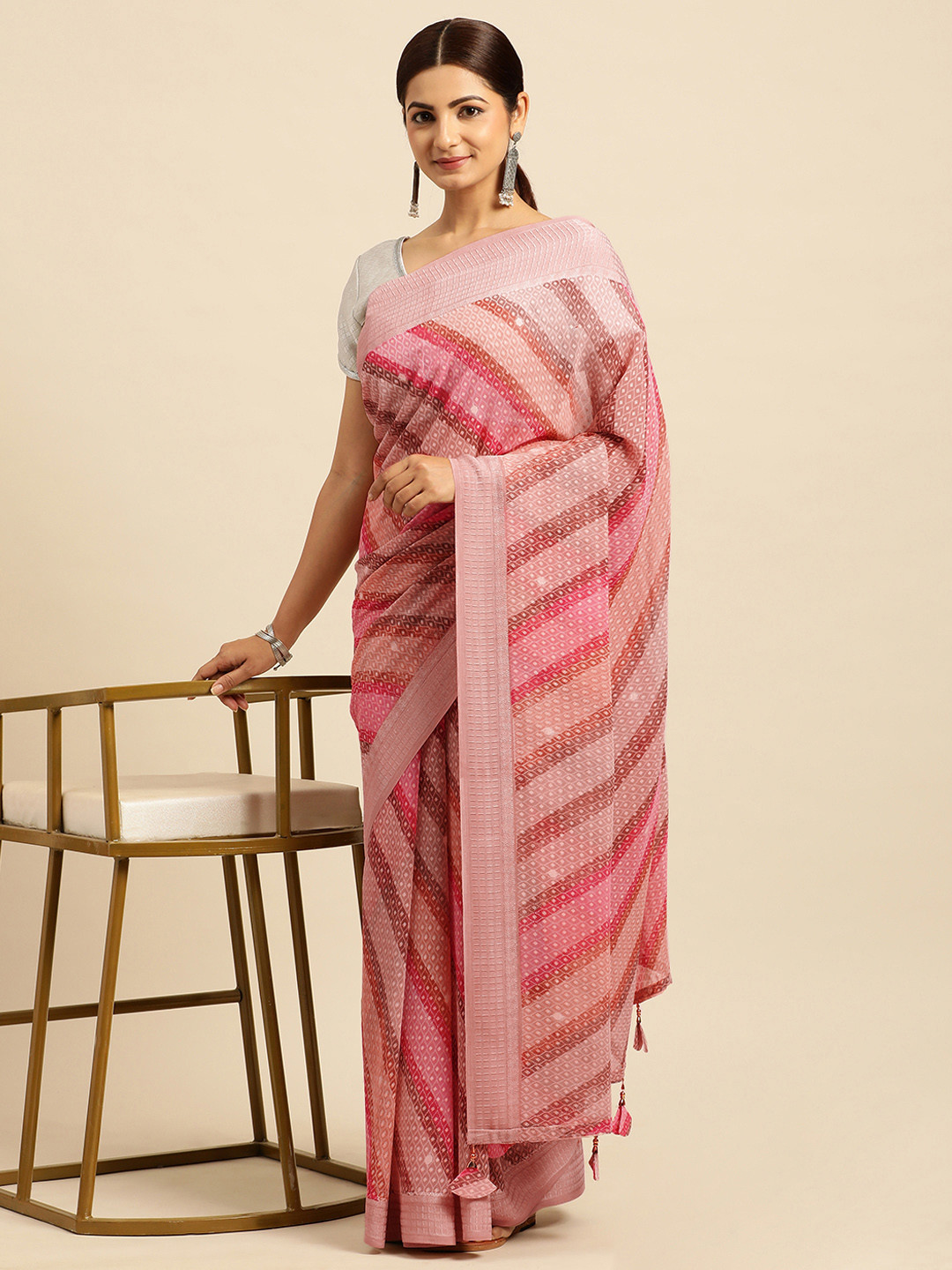 

Triveni Ethnic Motifs Embellished Pure Georgette Saree, Peach
