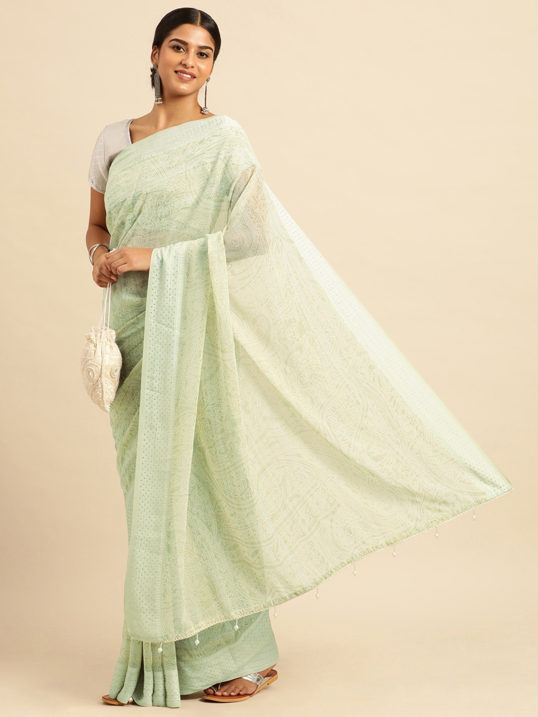 

Triveni Ethnic Motifs Stones-Studded Pure Georgette Saree, Green