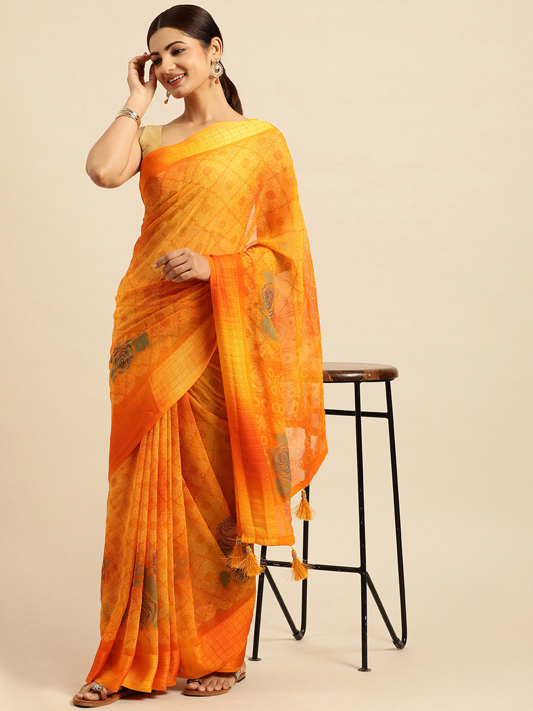 

Triveni Floral Stones-Studded Pure Georgette Saree, Orange