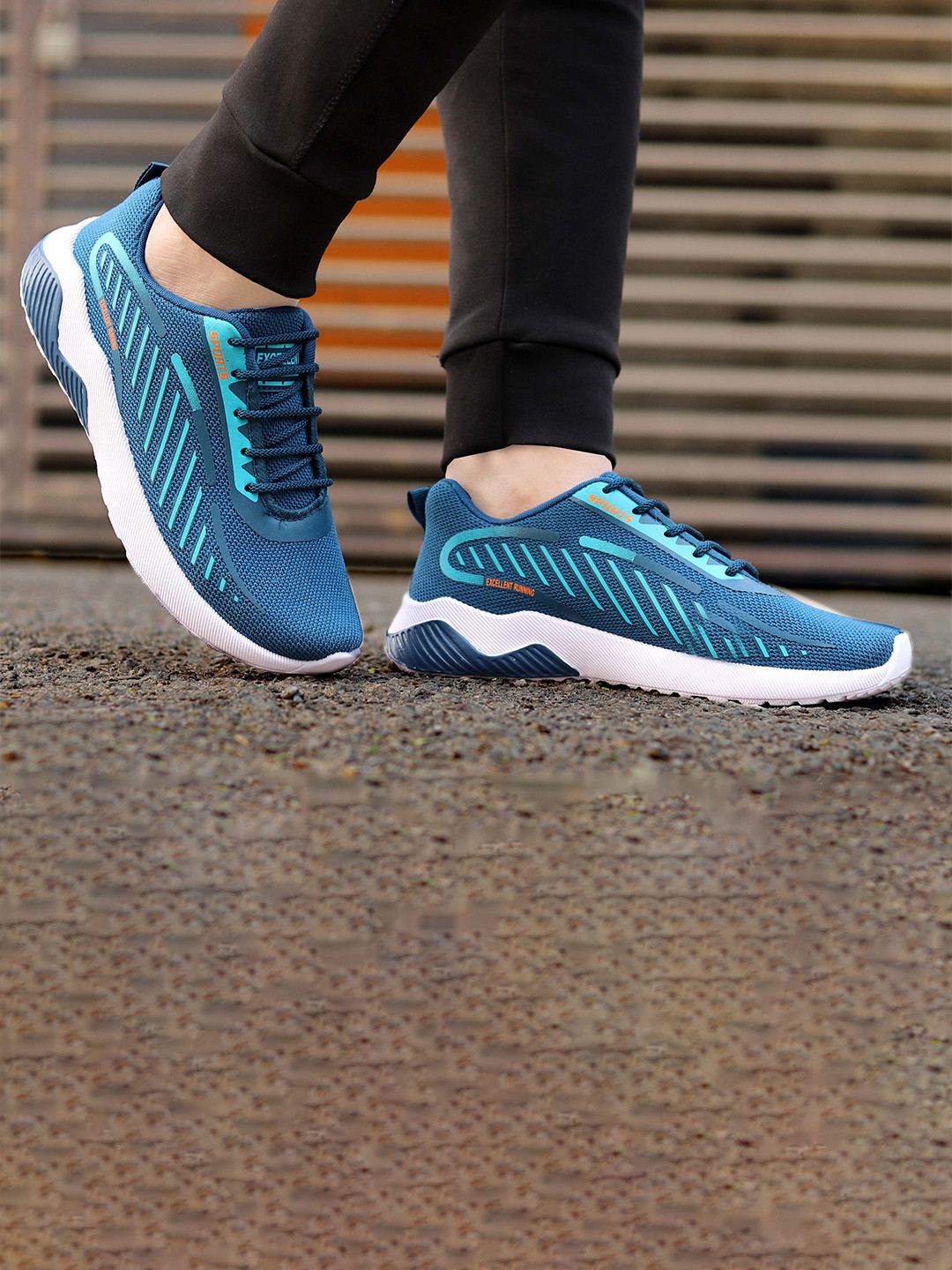 

aadi Men Printed Lightweight Comfort Insole Mesh Contrast Sole Sneakers, Teal