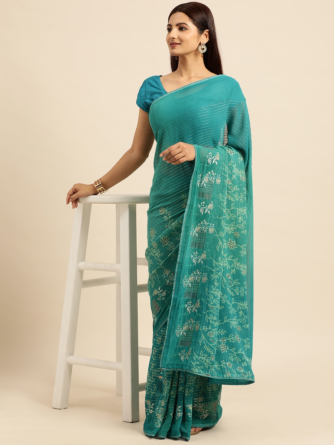 

Triveni Striped Sequinned Pure Georgette Saree, Teal