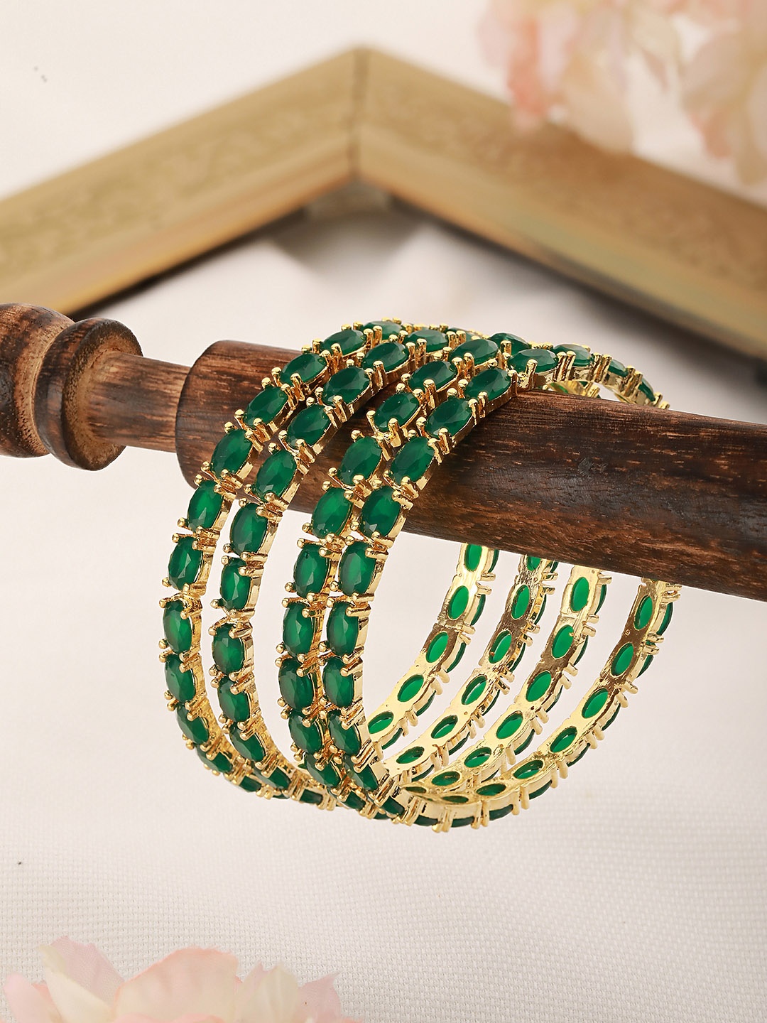 

Saraf RS Jewellery Set Of 4 Gold-Plated Emerald -Studded Bangles