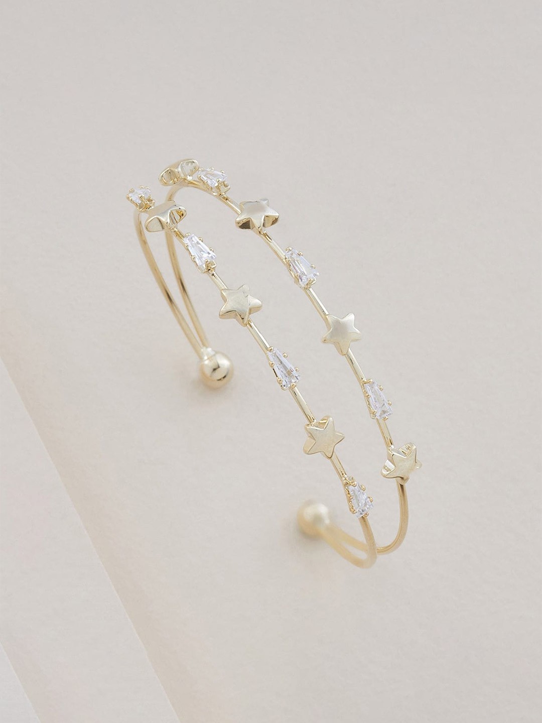 

Kushal's Fashion Jewellery Cubic Zirconia Gold-Plated Cuff Bracelet