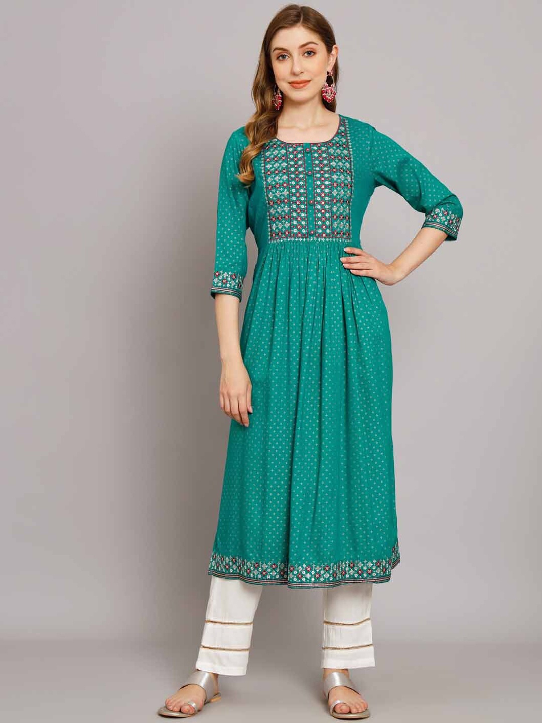 

Nehamta Ethnic Motifs Printed Pleated Thread Work Kurta With Palazzos, Turquoise blue
