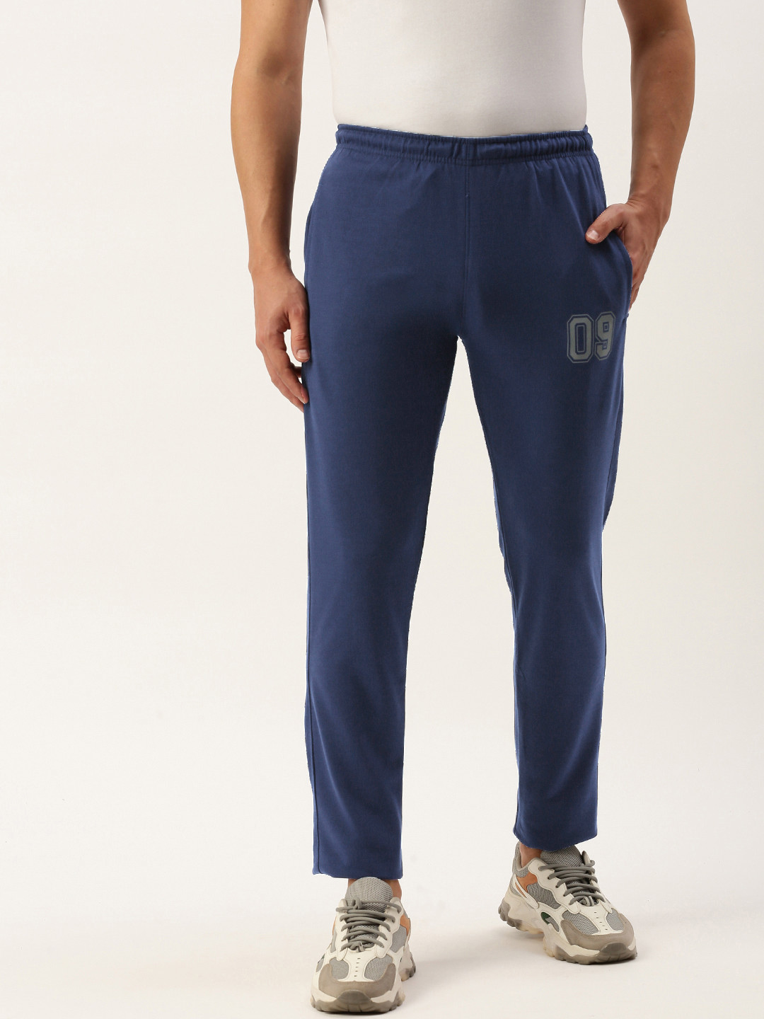 

Sports52 wear Men Solid Slim Fit Mid-Rise Knitted Cotton Training Or Gym Track Pants, Blue