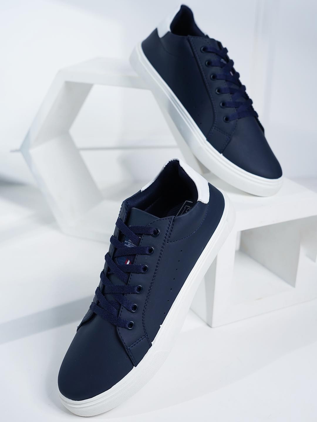 

Mast & Harbour Men Navy Blue And White Perforated Contrast Sole Sneakers