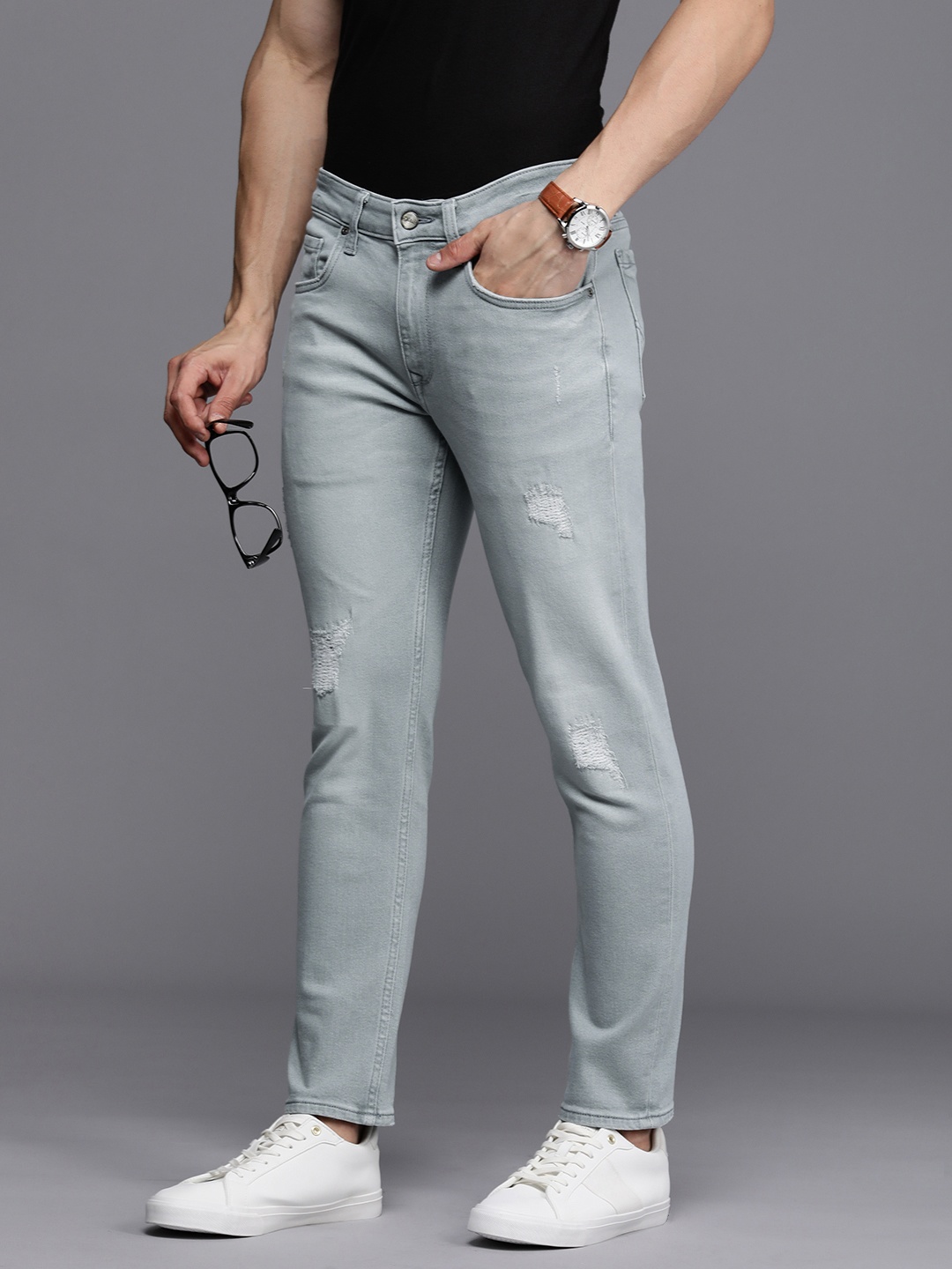 

Louis Philippe Jeans Men Smart Skinny Fit Mildly Distressed Light Fade Stretchable Jeans, Grey