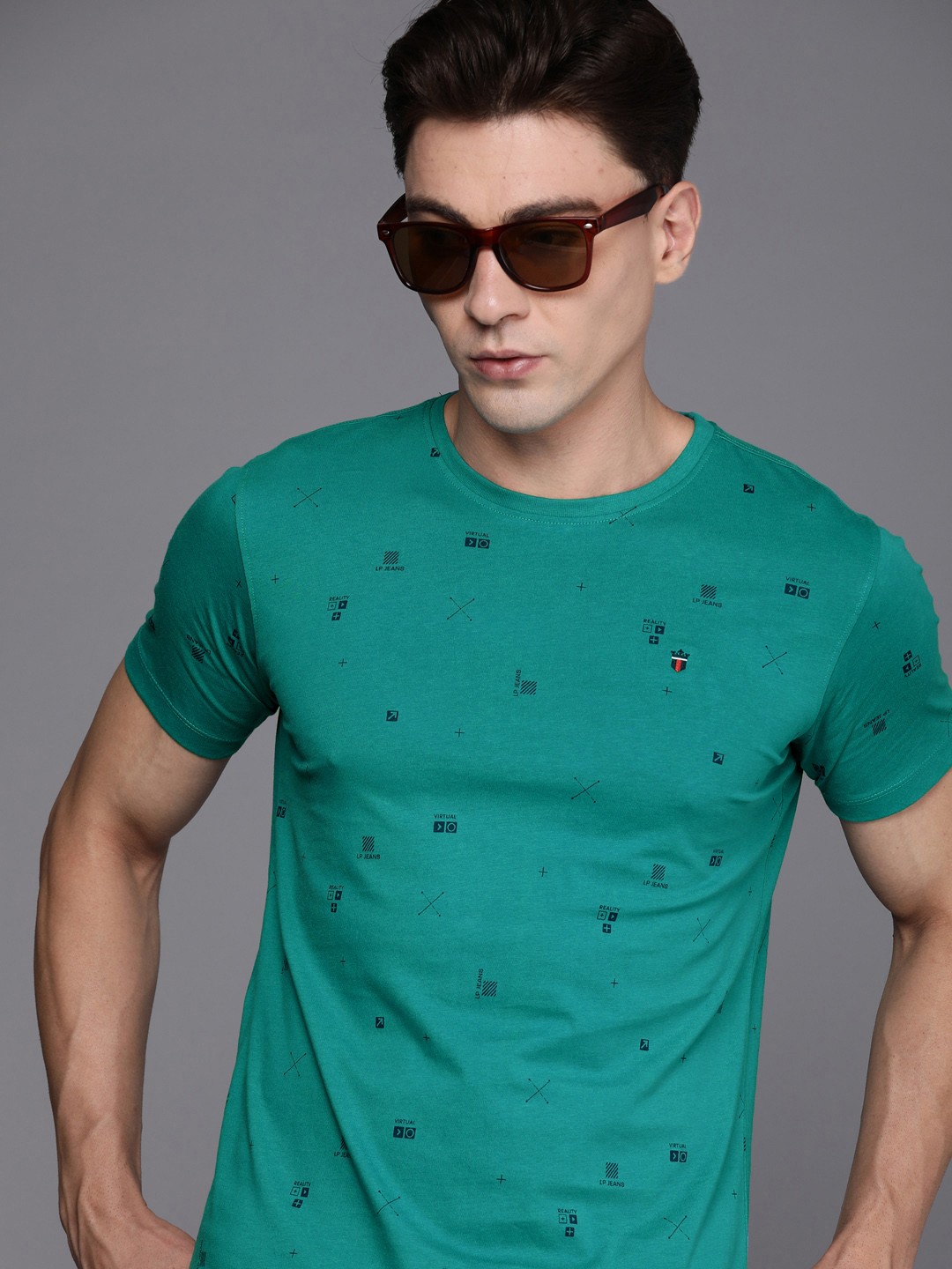

Louis Philippe Jeans Graphic & Typography Printed Pure Cotton Slim Fit T-shirt, Teal