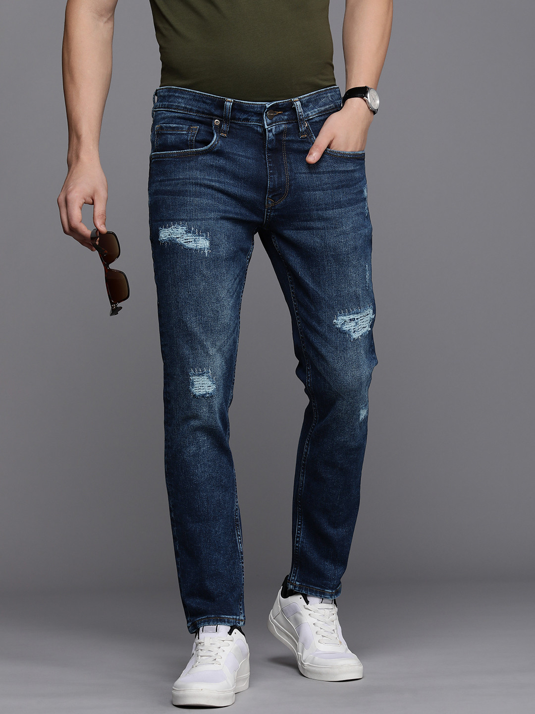 

Louis Philippe Jeans Men Power Skinny Fit Mildly Distressed Light Fade Stretchable Jeans, Blue