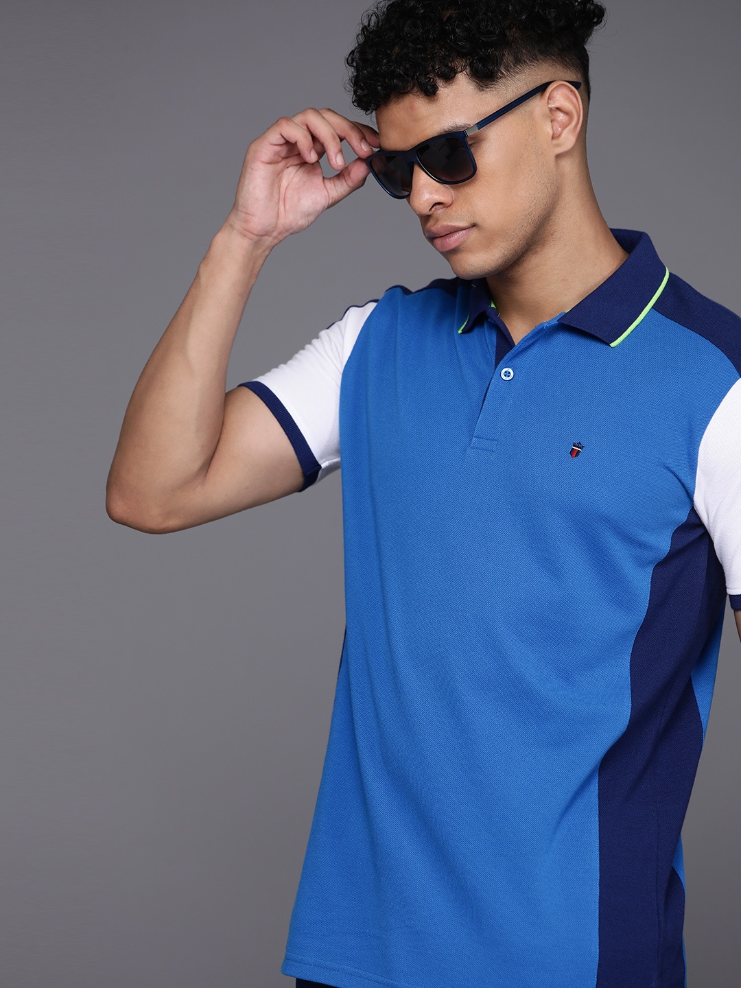 

Louis Philippe Sport Men Solid Polo Collar T-shirt, Blue