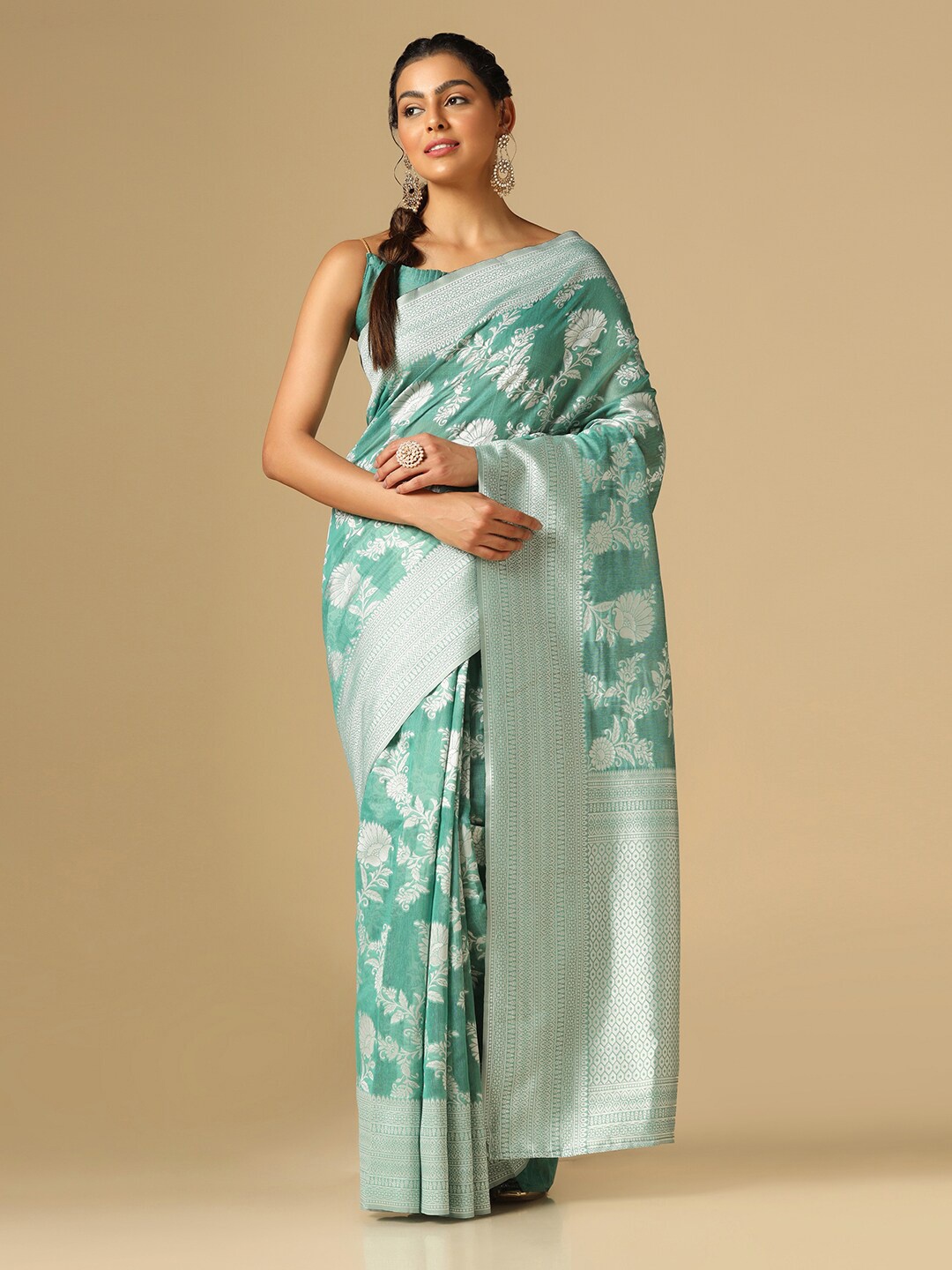 

Satrani Sea Green & Silver-Toned Floral Woven Design Zari Banarasi Saree