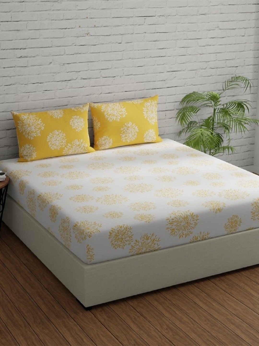 

Huesland Comfort White & Yellow Printed 144 TC Cotton King Bedsheet & 2 Pillow Covers