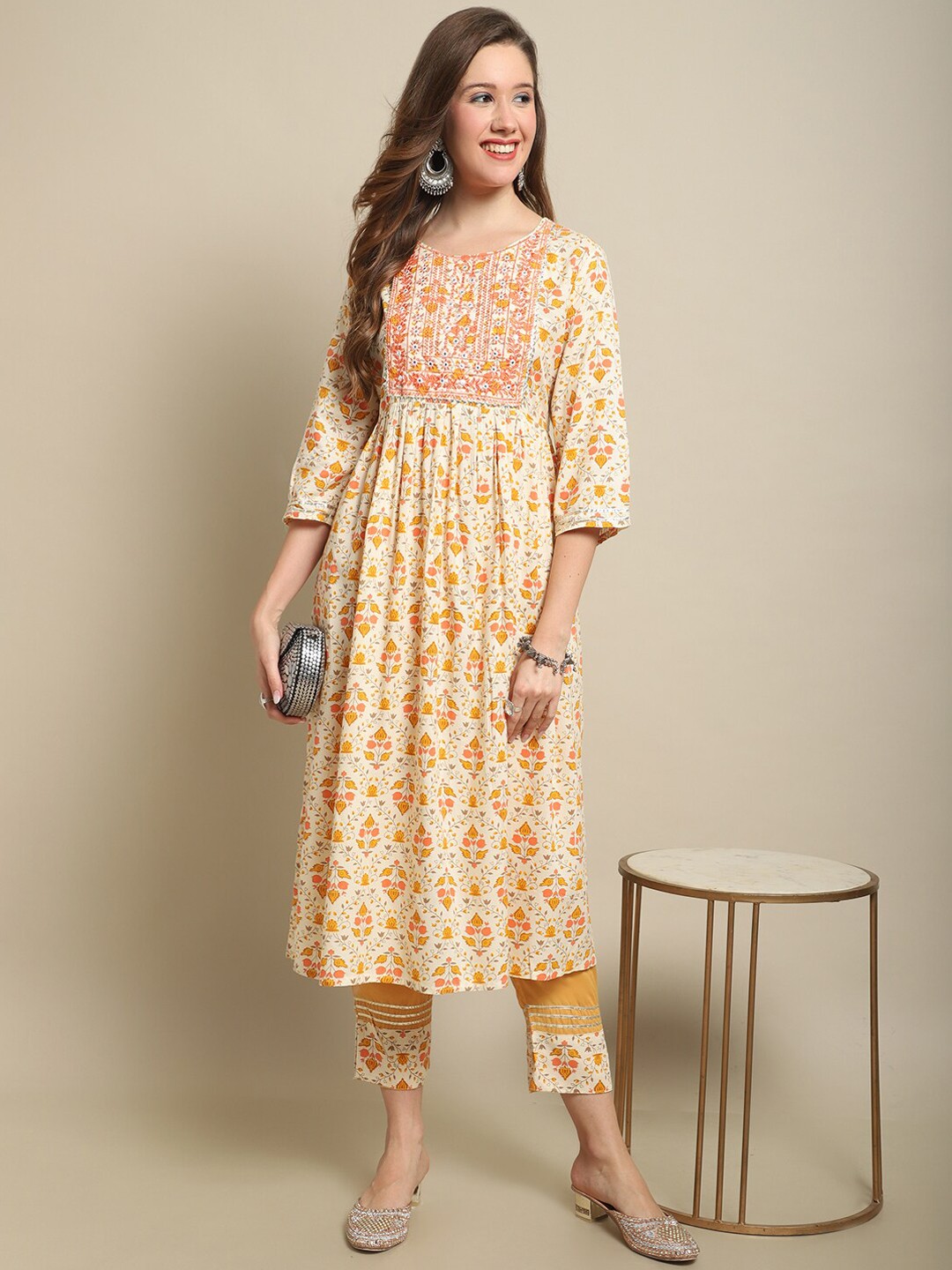 

Sangria White & Yellow Floral Printed Mirror Work A-Line Kurta With Trouser