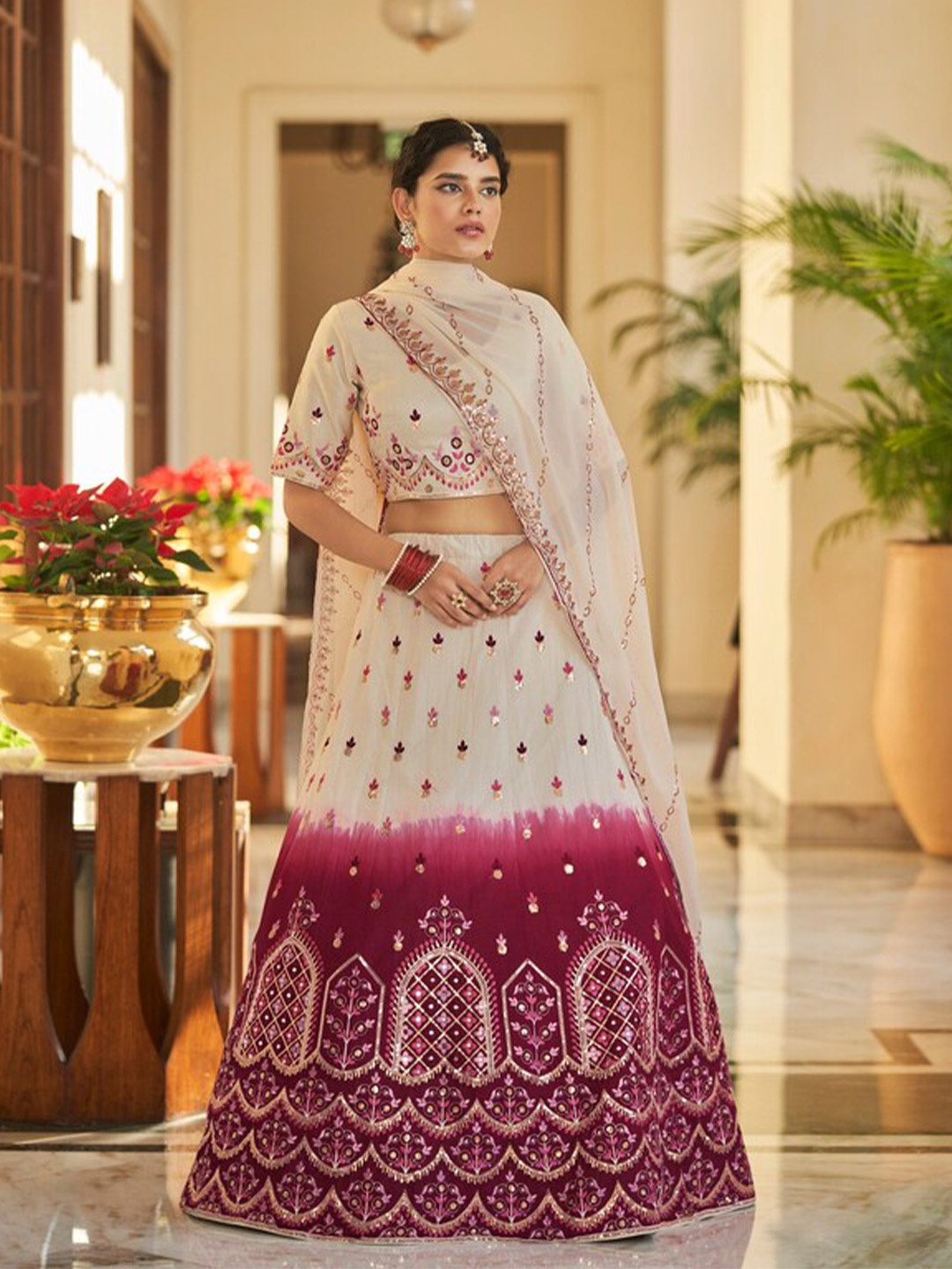 

Exclusiva Embroidered Semi-Stitched Lehenga And Unstitched Blouse With Dupatta, Cream