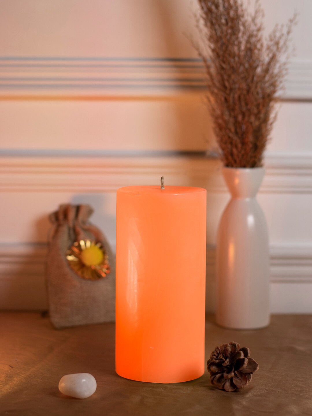 

Dhrohar Oriental Scented Orange-Colored Orange Blossom Pillar Candle