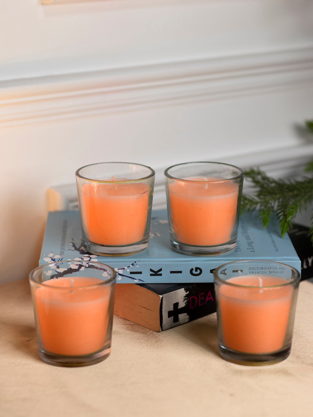 

Dhrohar Orange 4 PC Votive Candles