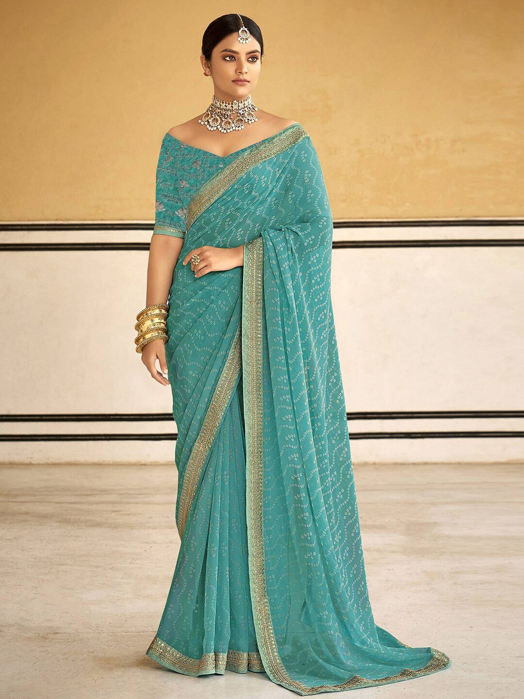 

Anouk Blue & Gold Toned Embroidered Pure Georgette Bandhani Saree