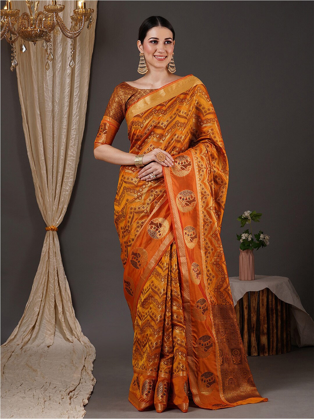 

Anouk Mustard & Brown Ethnic Motifs Woven Design Zari Organza Banarasi Saree
