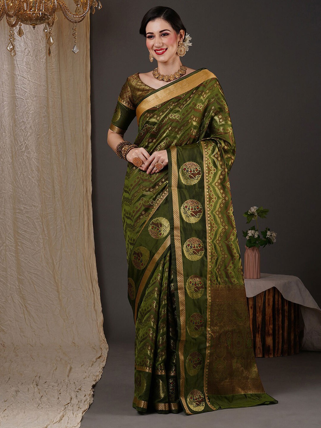 

Anouk Green & Gold Toned Floral Woven Design Zari Organza Banarasi Saree