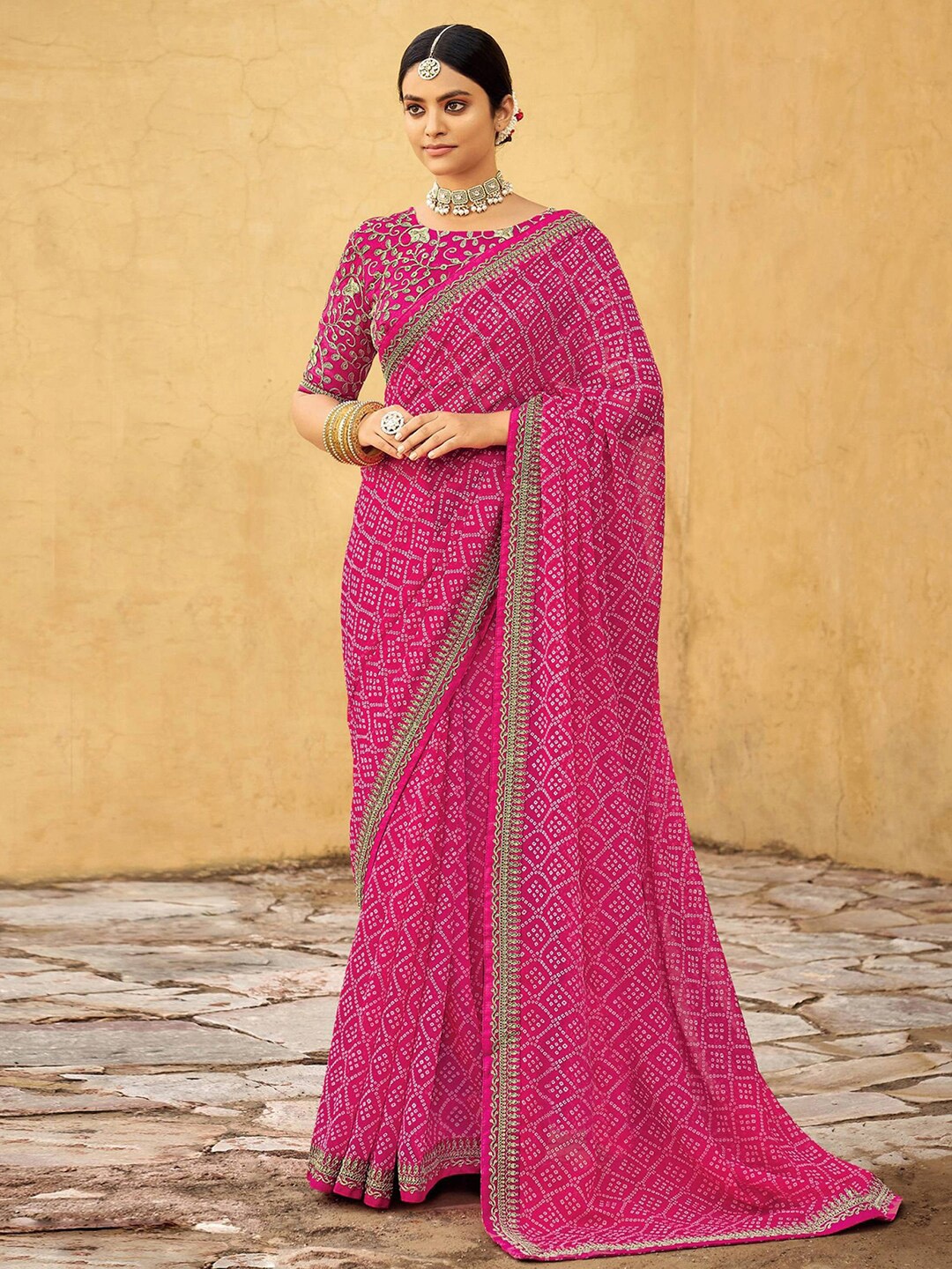 

Anouk Pink & White Bandhani Embroidered Pure Georgette Bandhani Saree