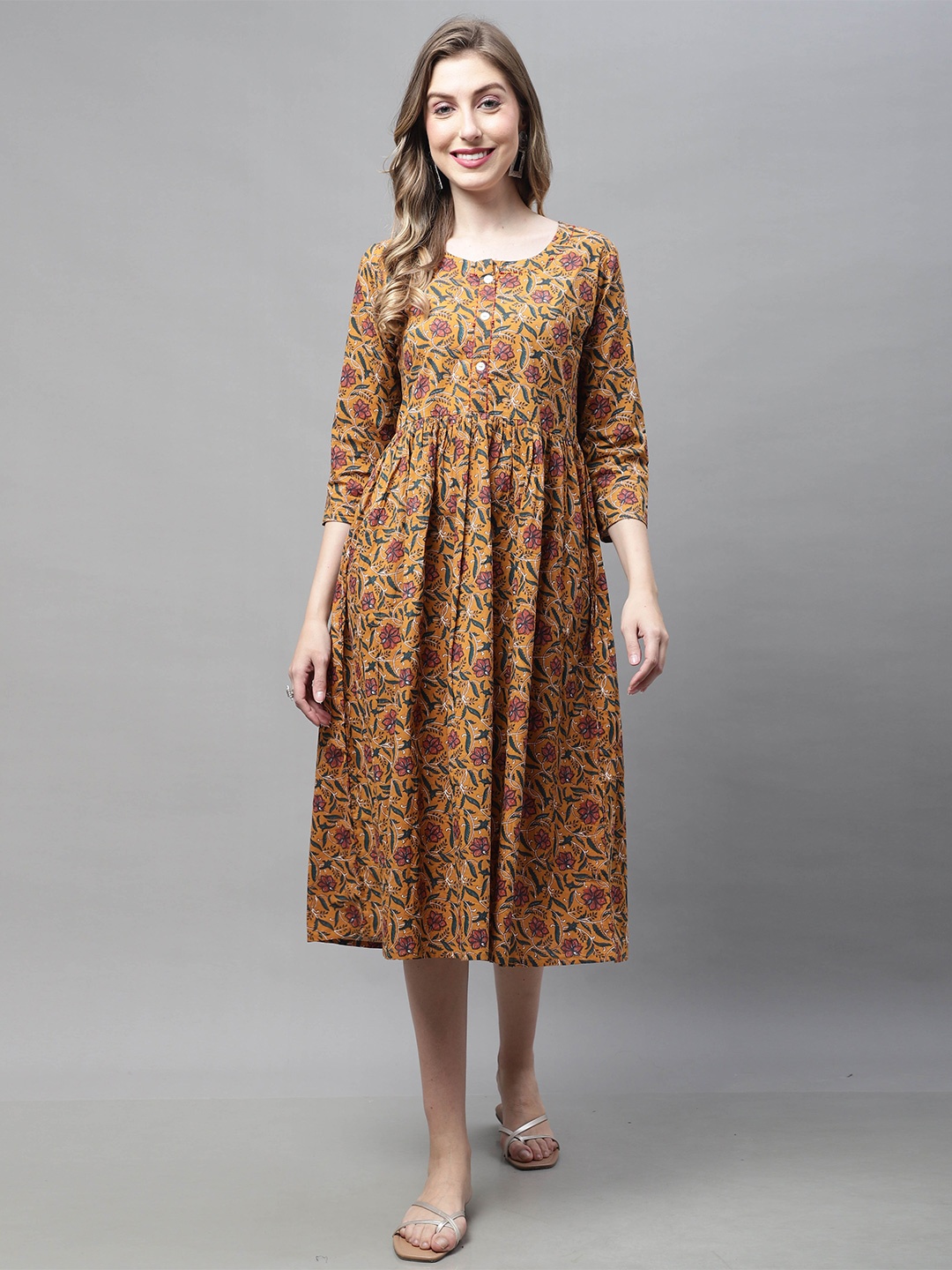 

Rajnandini Floral Printed Pure Cotton Ethnic Dresses, Mustard