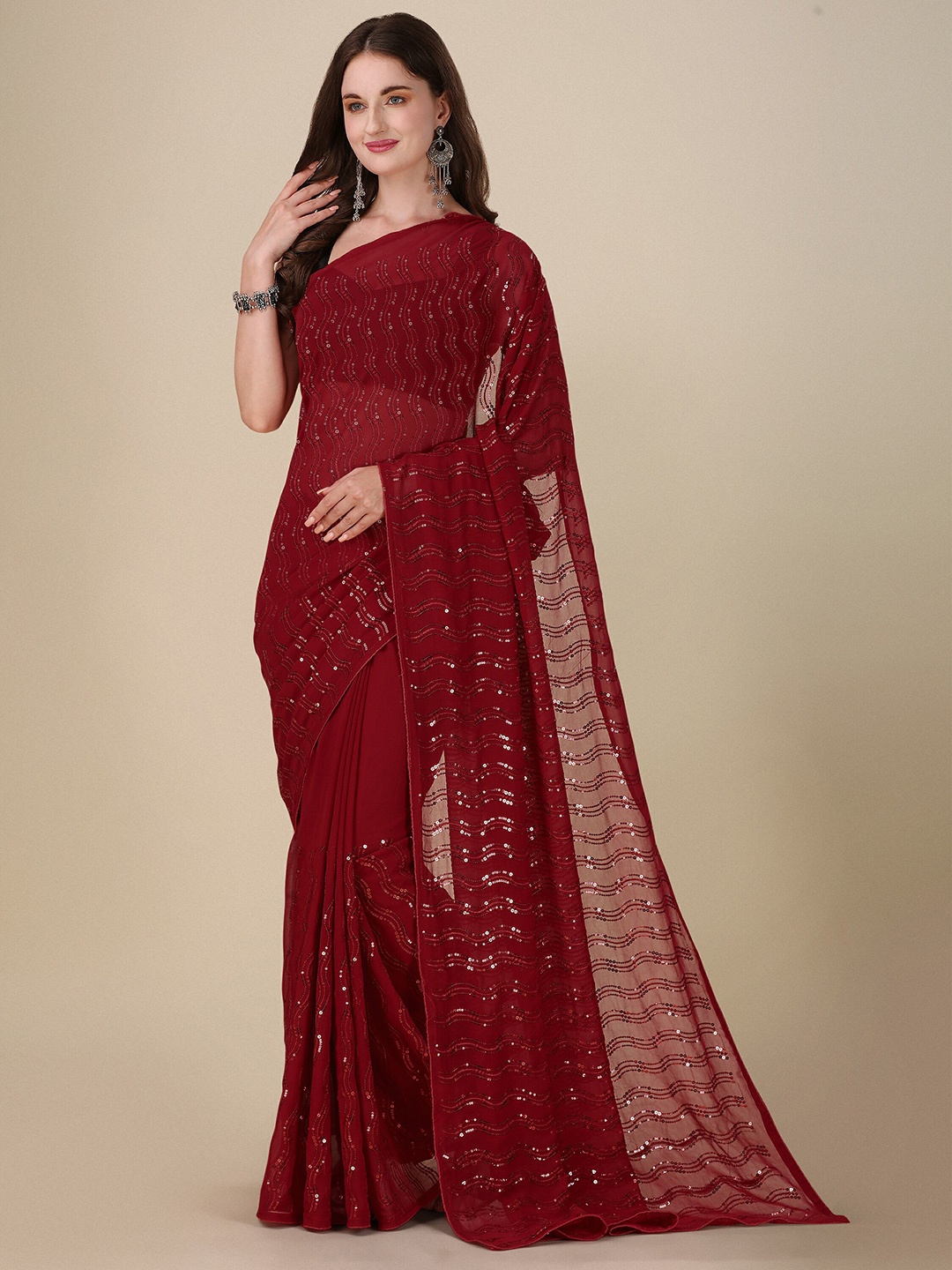 

Mitera Maroon Embellished Sequinned Pure Georgette Saree