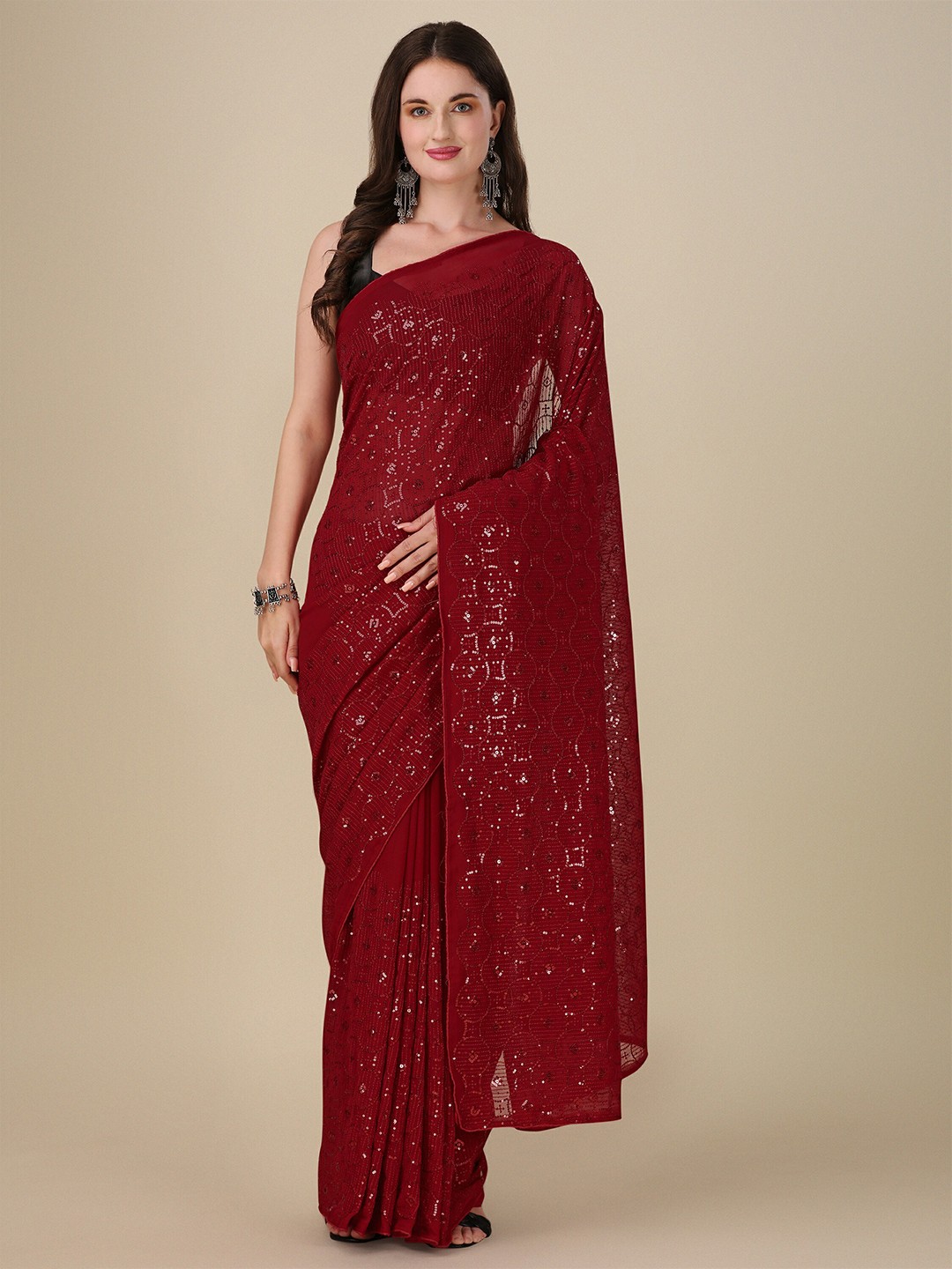 

Mitera Maroon Sequinned Embellished Pure Georgette Saree