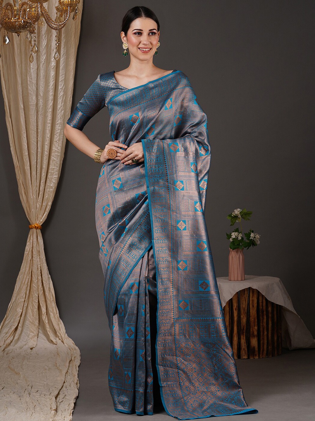 

Saree mall Blue & Gold-Toned Ethnic Motif Woven Design Zari Kanjeevaram Sarees