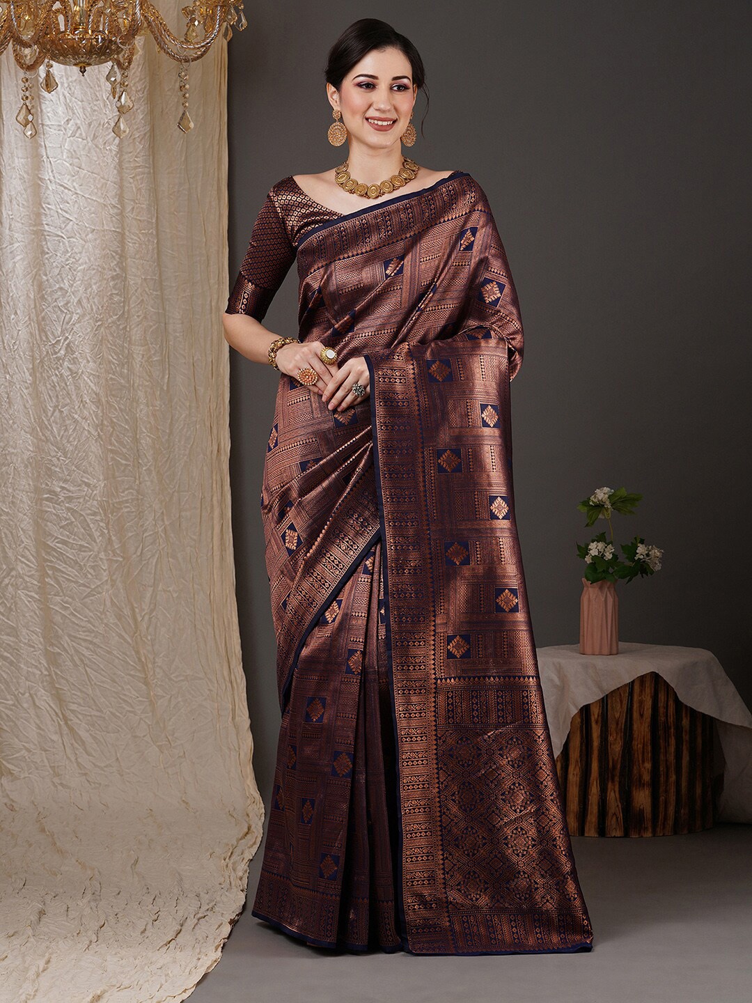 

Saree mall Navy Blue & Copper-Toned Ethnic Motif Woven Design Zari Kanjeevaram Sarees