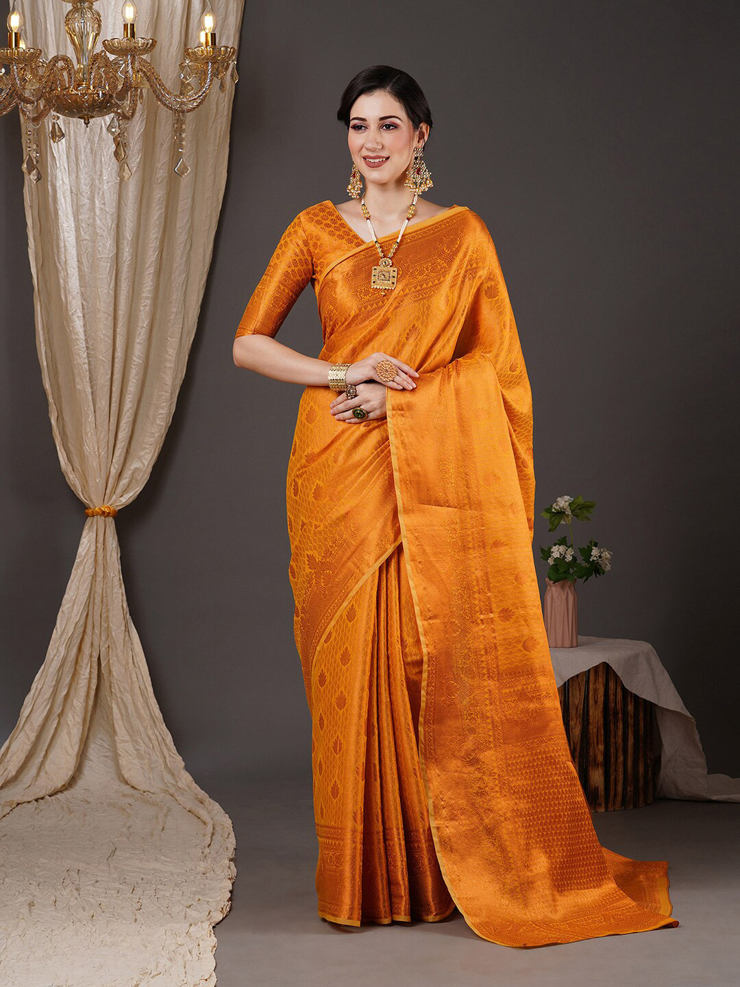 

Saree mall Copper-Toned Floral Motif Woven Design Zari Kanjeevaram Sarees