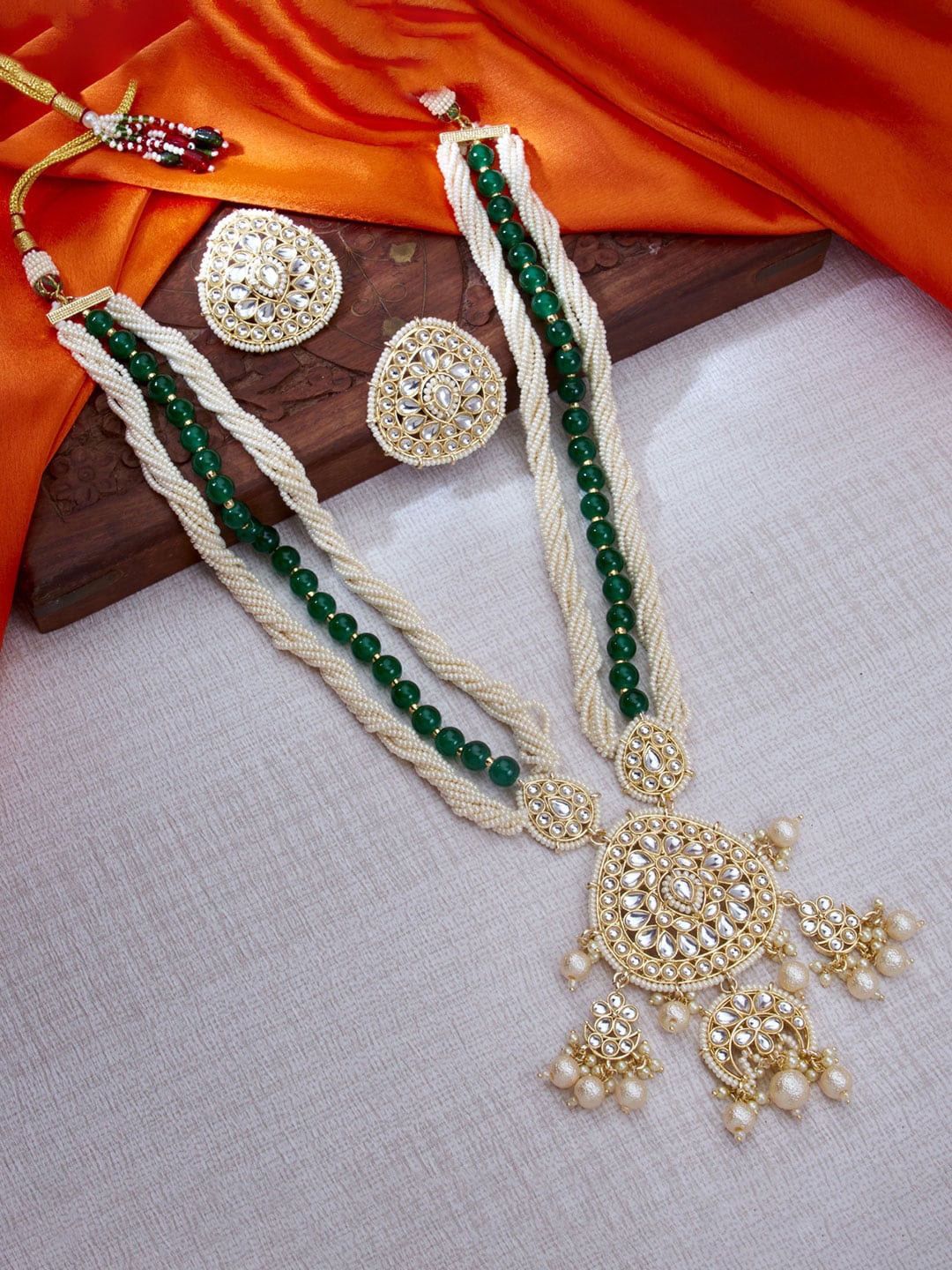 

Sukkhi Gold Plated Kundan Necklace With Earrings