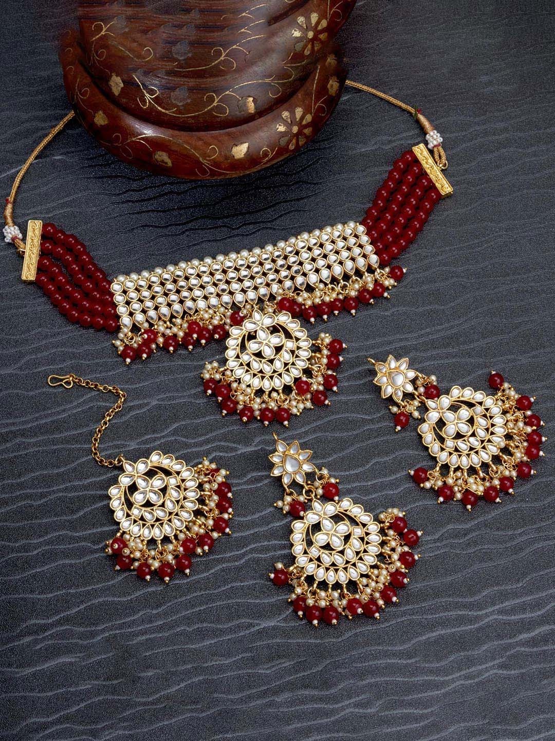 

Sukkhi Gold Plated Kundan Choker Necklace Jewellery Set