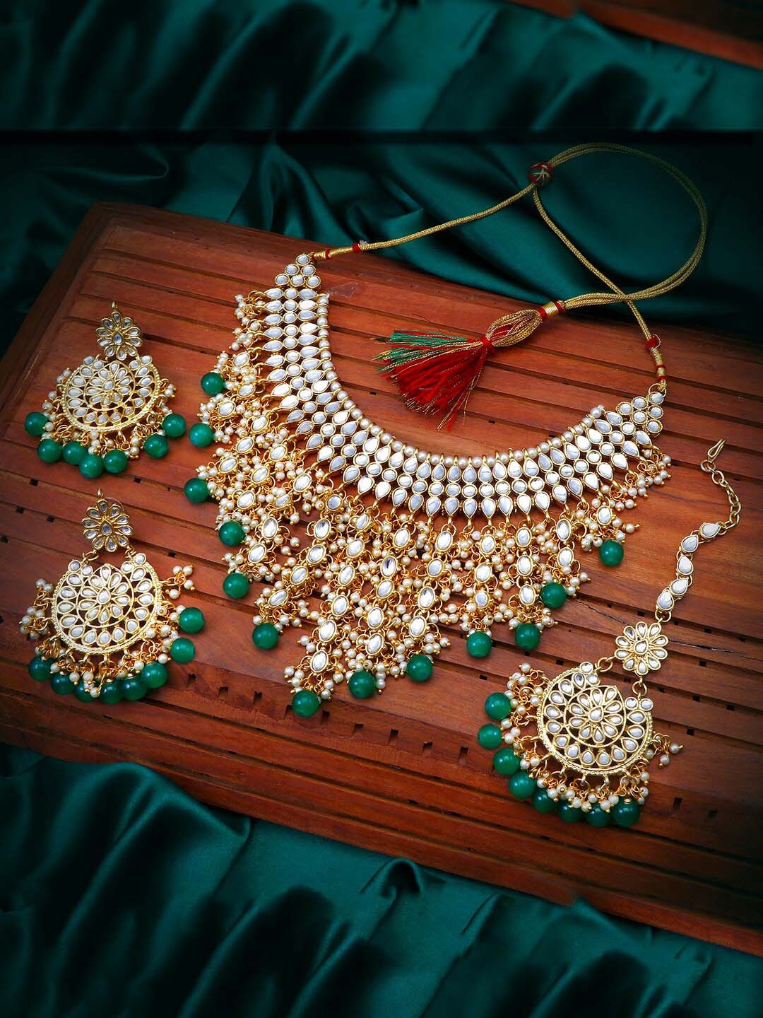 

Sukkhi Gold-Plated Kundan Choker Necklace Set With Maang Tikka