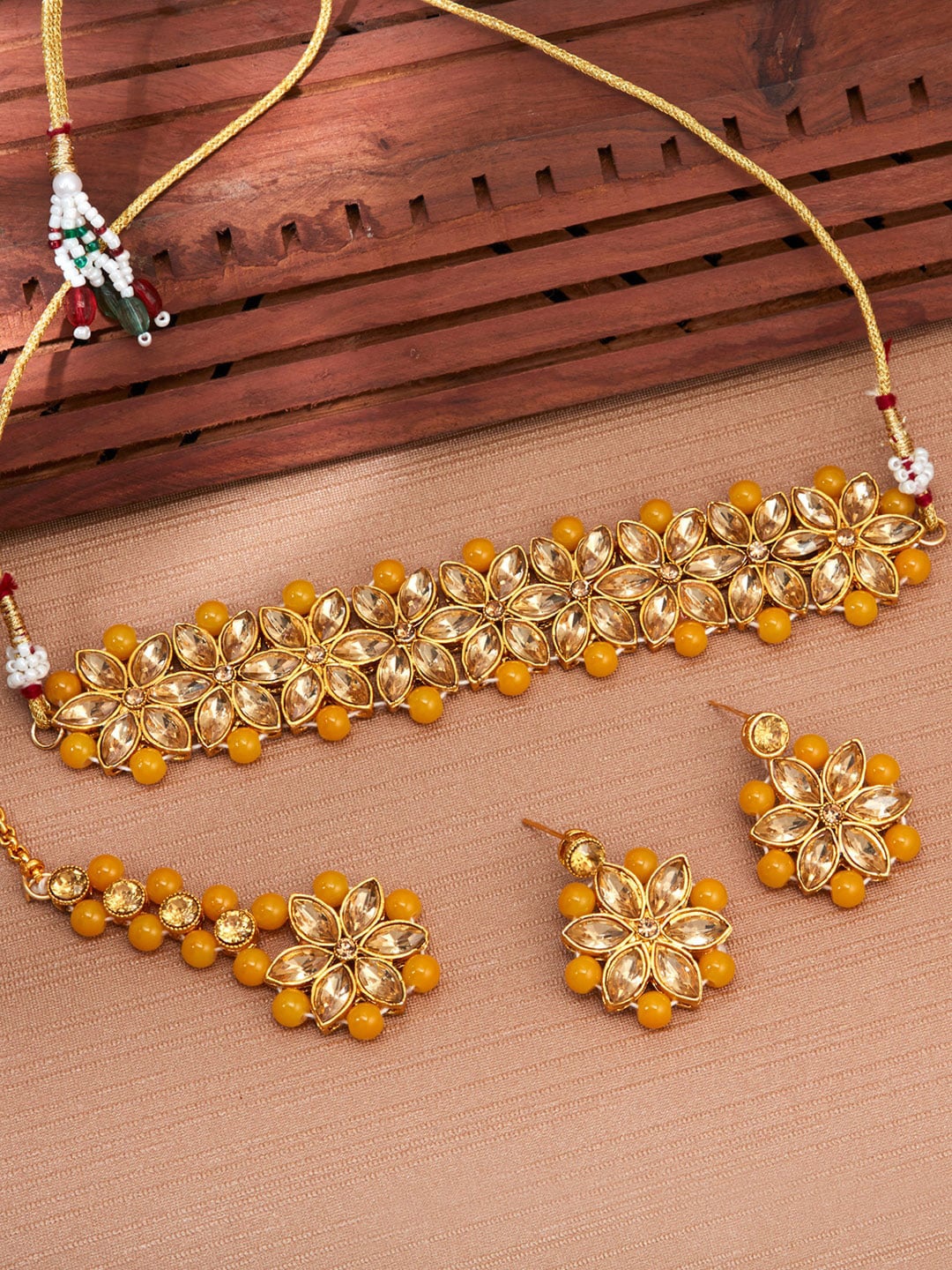 

Sukkhi Gold-Plated Choker Necklace Set With Maang Tika