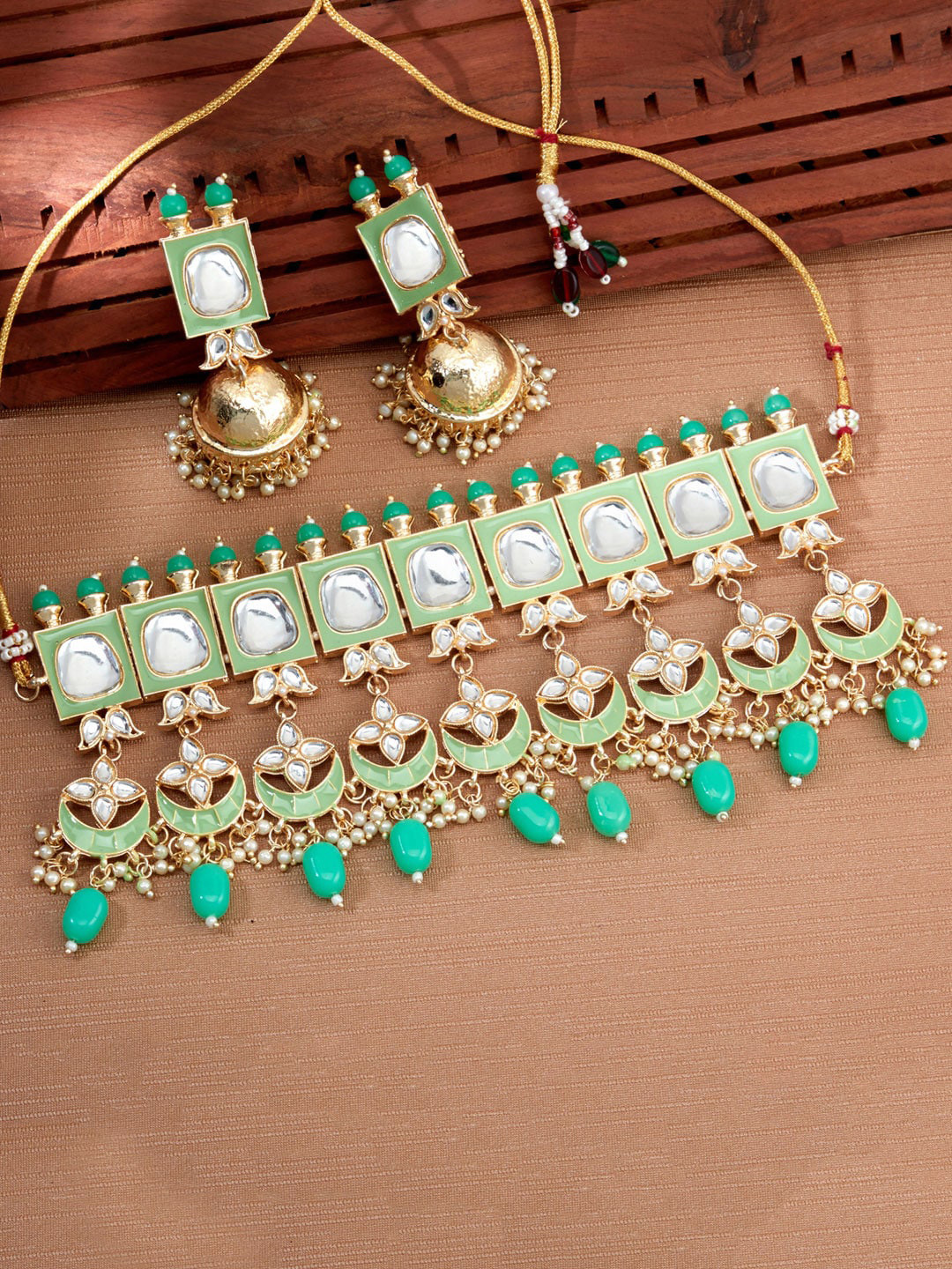 

Sukkhi Gold Plated Kundan Choker Jewellery Set