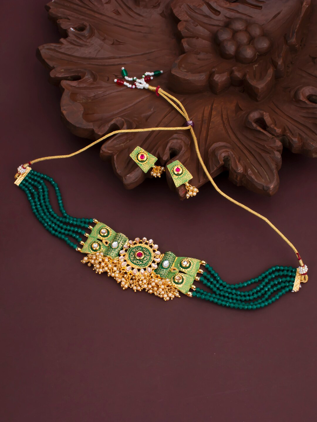 

Sukkhi Gold Plated Kundan Choker Necklace Set