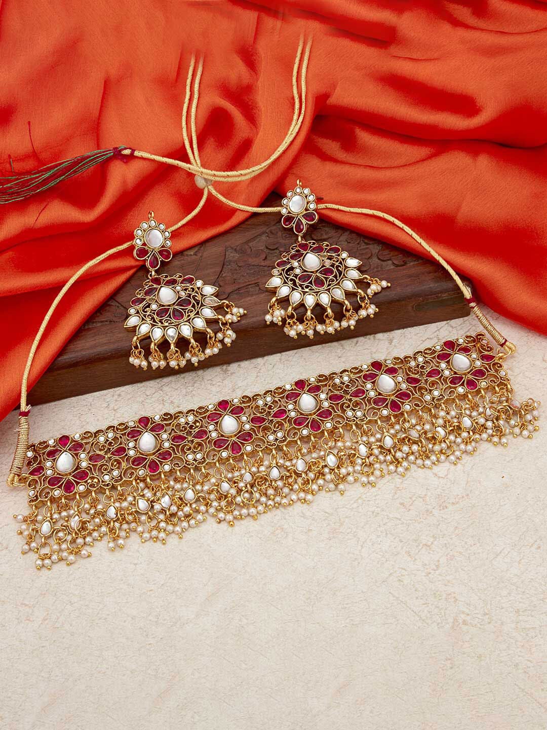 

Sukkhi Gold Plated Kundan Choker Necklace Set