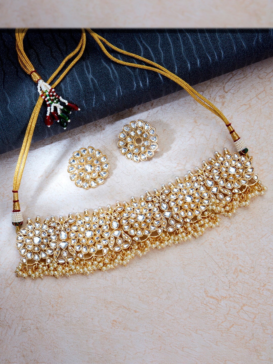 

Sukkhi Gold-Plated Artificial Stones and Beads Choker Necklace Set