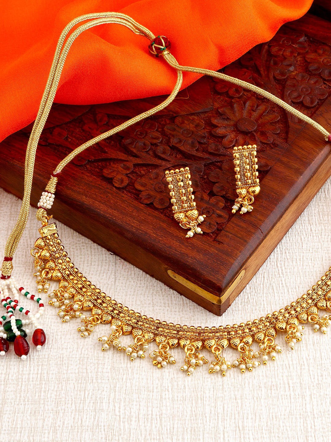 

Sukkhi Gold-Plated Artificial Beads Choker Necklace Set