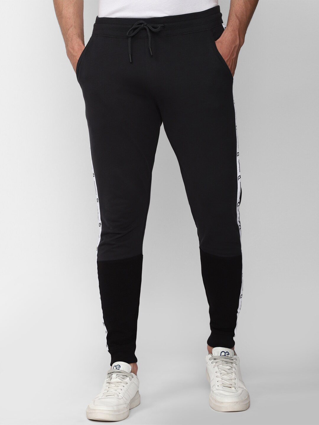 

Peter England Men Mid Rise Regular Fit Cotton Joggers, Black