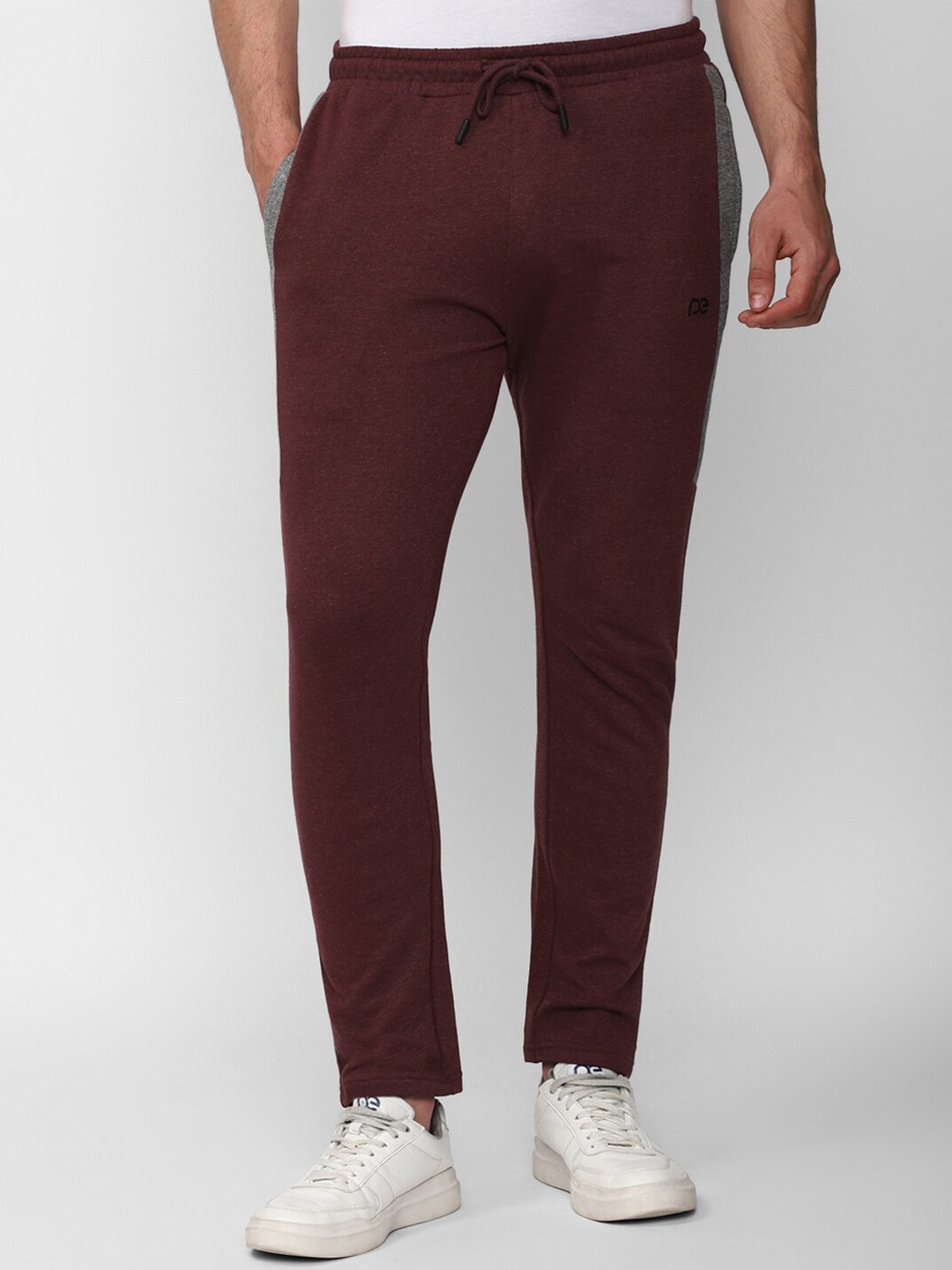 

Peter England Men Mid Rise Regular Fit Cotton Track Pants, Maroon