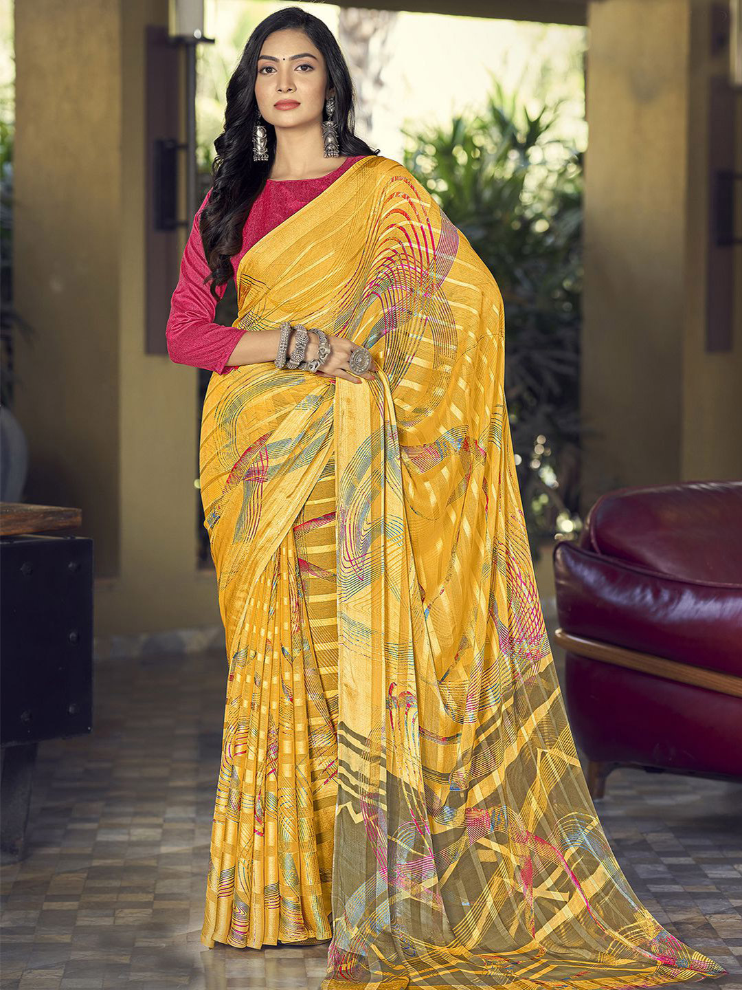 

Mitera Yellow & Pink Striped Poly Chiffon Saree