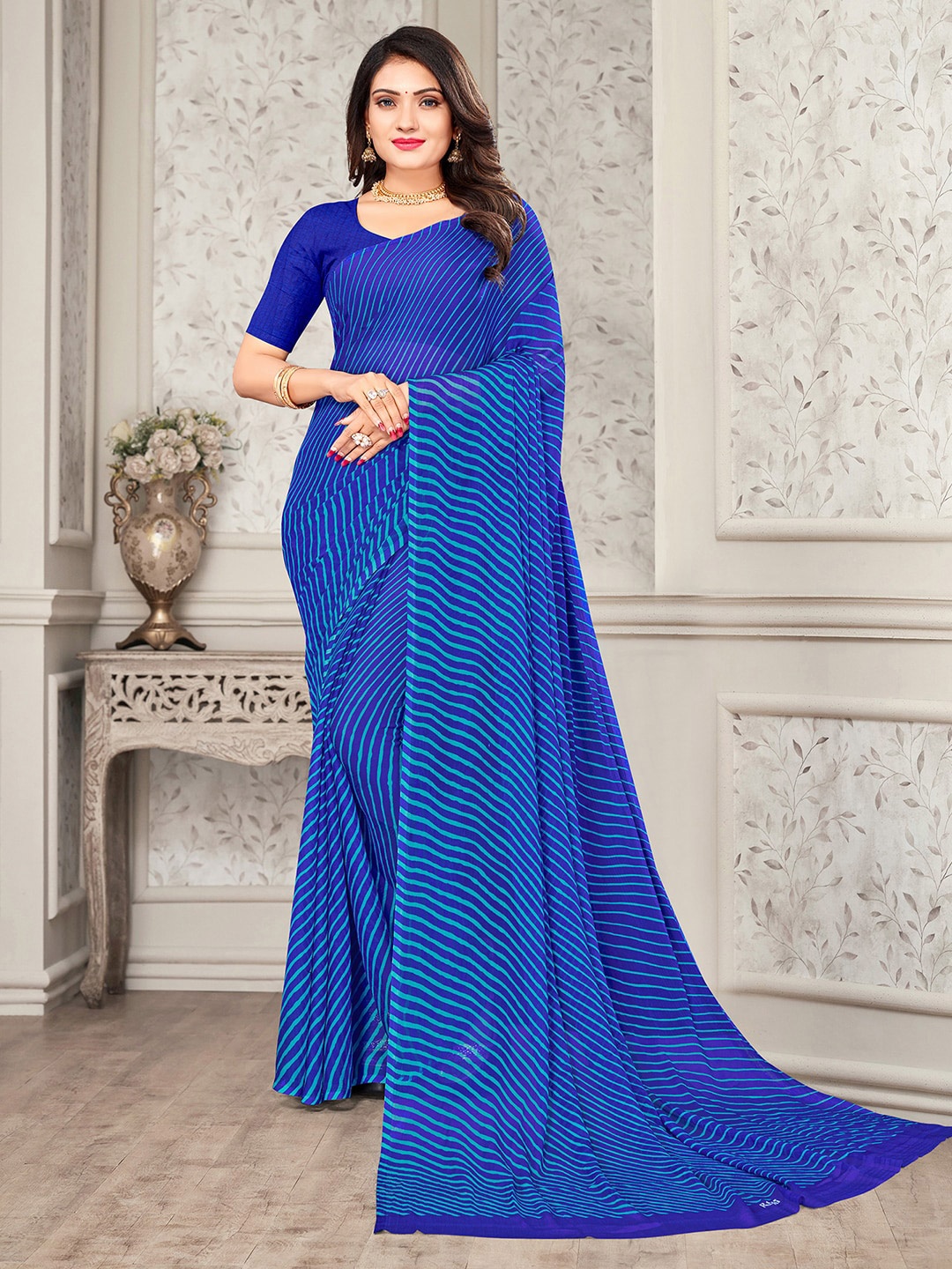 

Satrani Blue Poly Chiffon Leheriya Saree