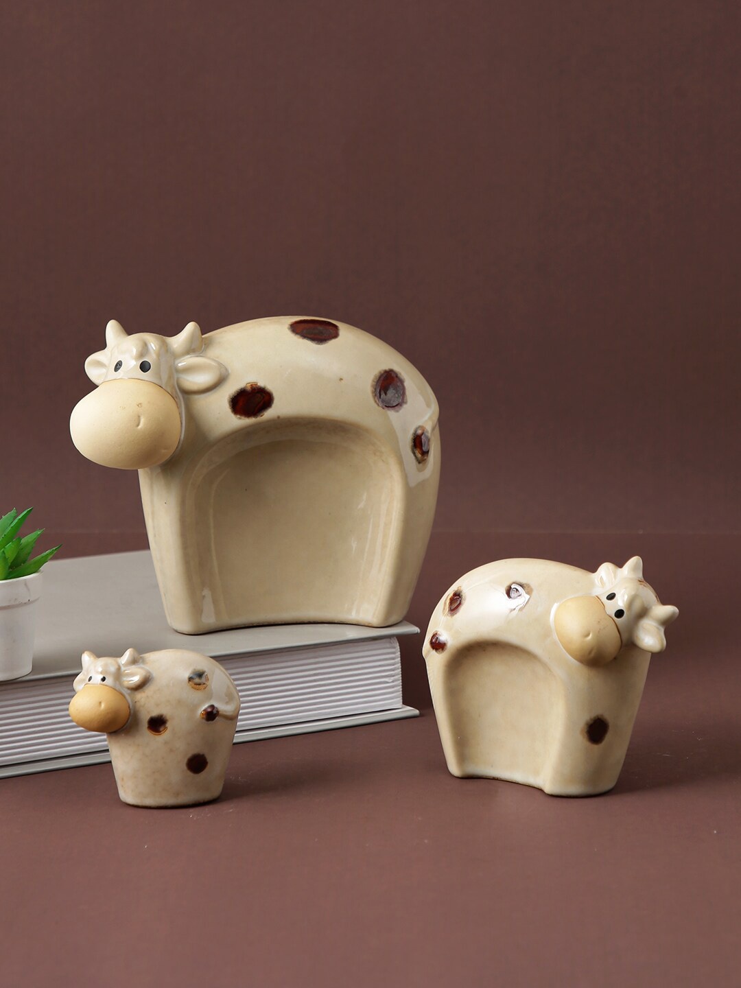 

TAYHAA Beige & Brown 3 Pieces Textured Cow Ceramic Showpieces