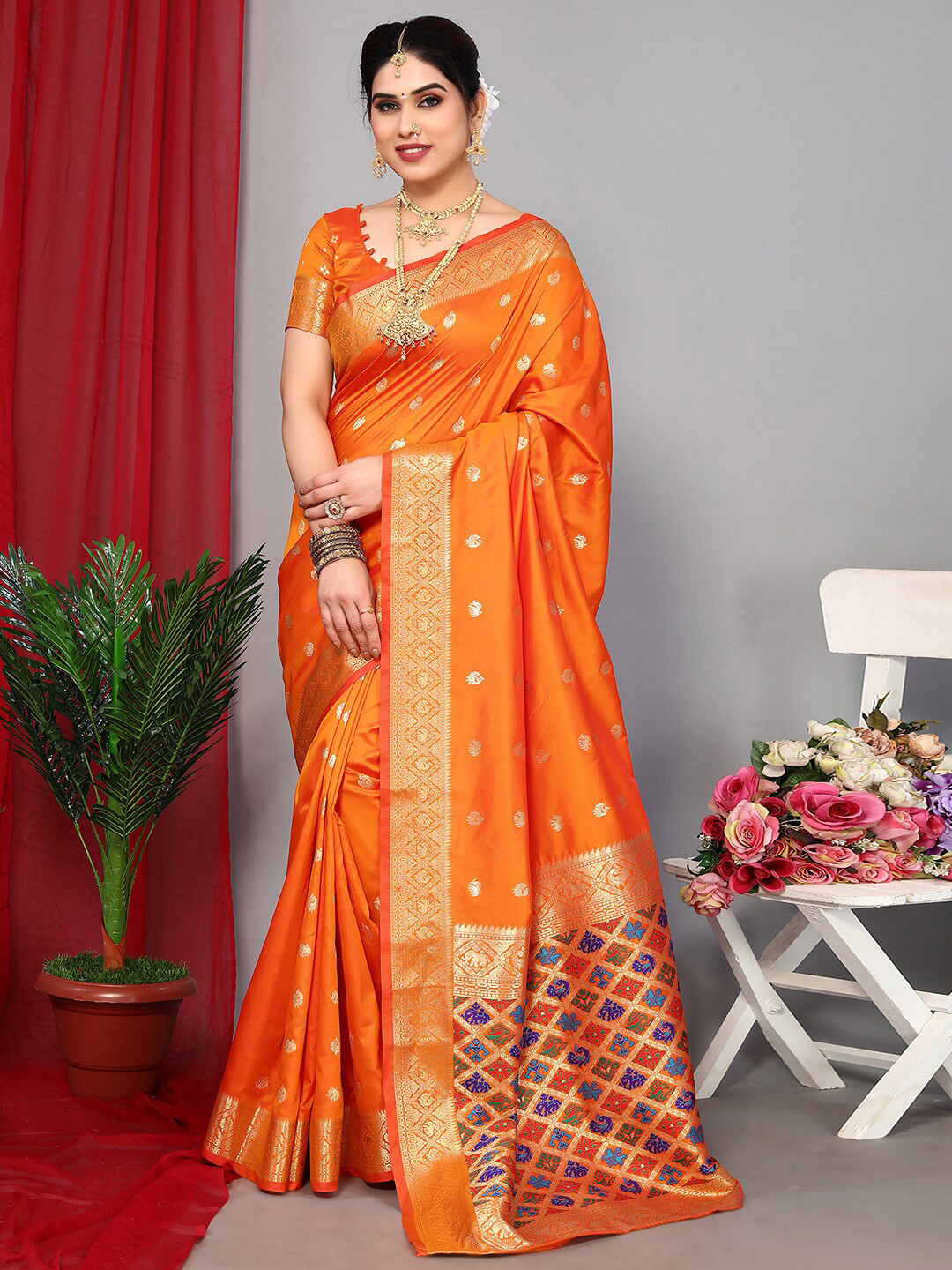 

Satrani Orange Woven Design Paithani Saree