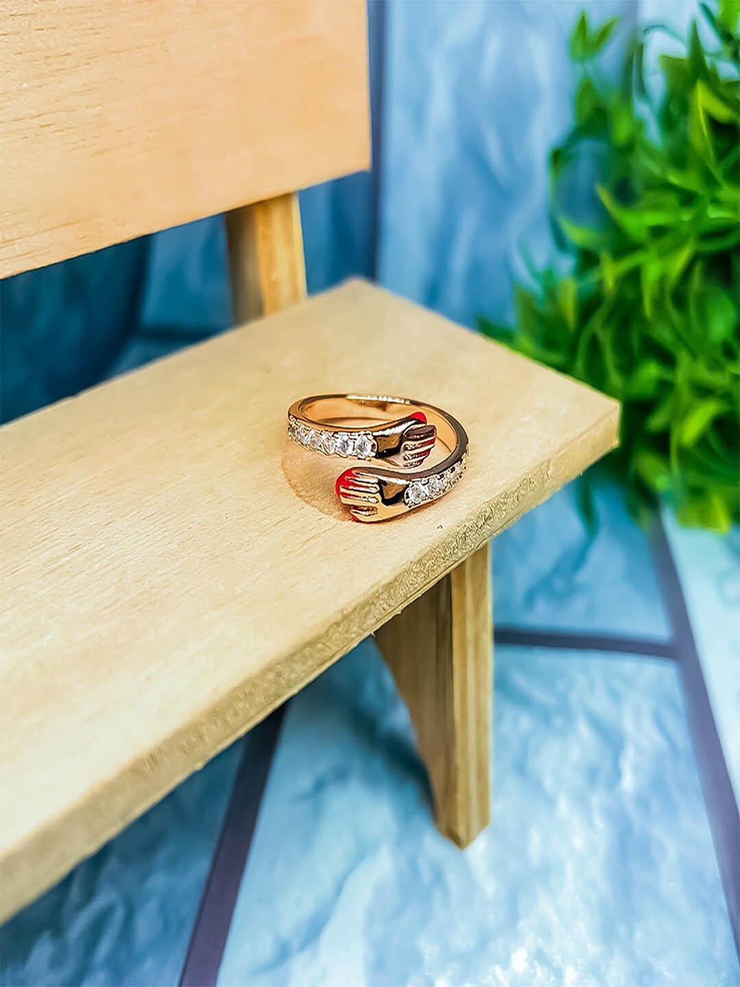 

UNIVERSITY TRENDZ Rose Gold-Plated Crystal-Studded Enamelled Hug Hand Finger Ring