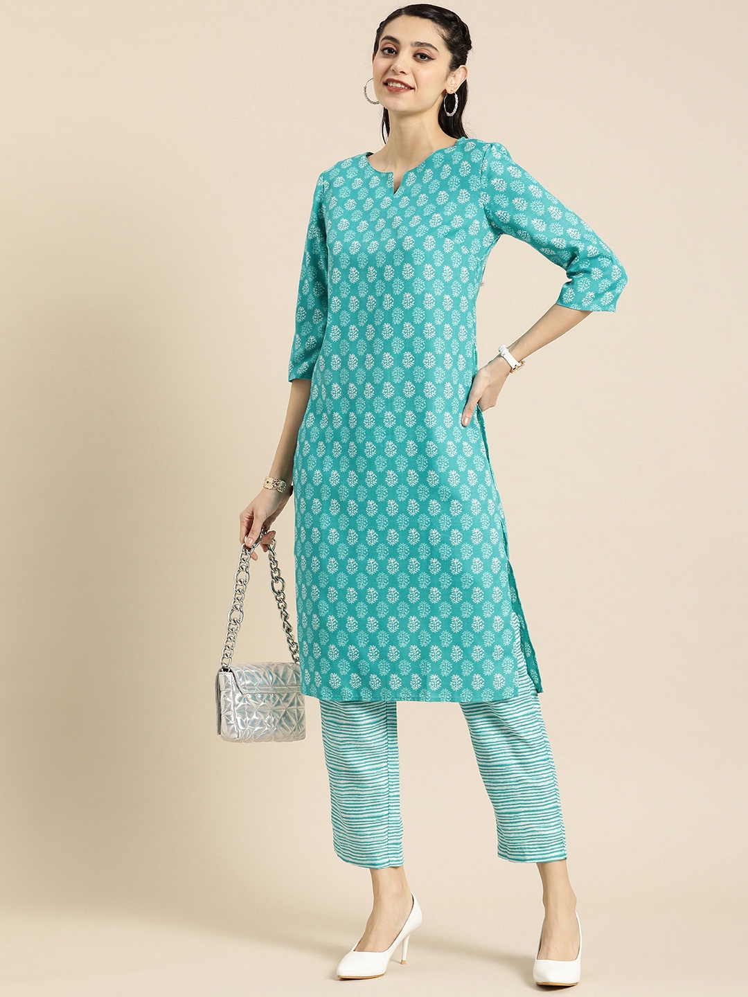 

Anouk Women Teal Printed Kurta with Trousers, Turquoise blue