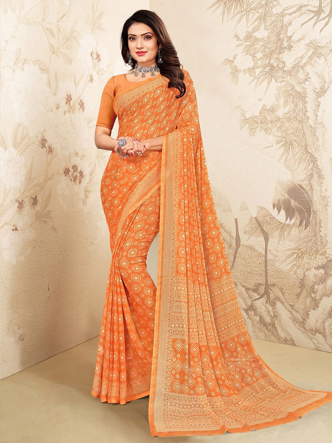 

Mitera Orange & Beige Bandhani Printed Saree