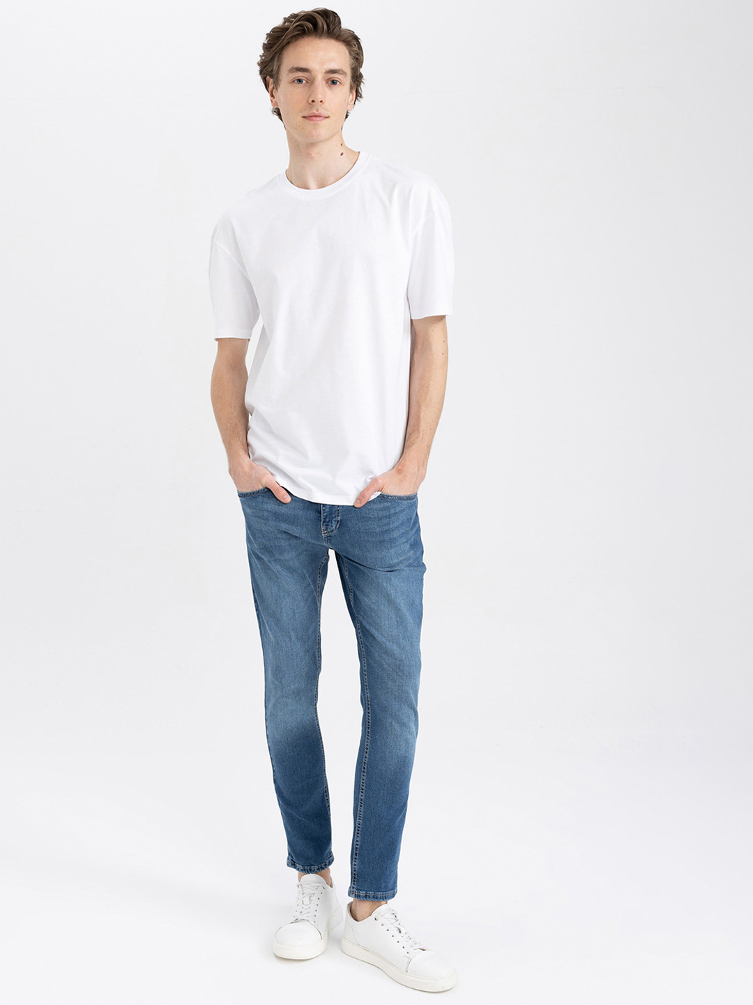 

DeFacto Men Mid-Rise Heavy Fade Medium Shade Jeans, Blue